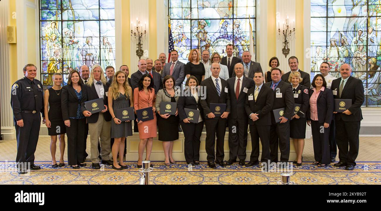 The 2015 Individual and Community Preparedness Awards: Photo includes the 2015 winners (Sarah Babcock, Brian Blake, Douglas Bryson, Douglas Eades, Brenda Emrick, Iskra Gencheva, Yuri Graves, Amalio Jusino, Betsy Miller, Brooke Mills, Frank Southern, Ryan Turner, Bill Whalen, Craig Wolfe); guests of the winners; representatives from American Red Cross, International Association of Emergency Managers, National Emergency Management Association, National Oceanic and Atmospheric Administration and Target; Deputy Administrator of FEMA for Protection and National Preparedness, Timothy Manning; FEMA A Stock Photo