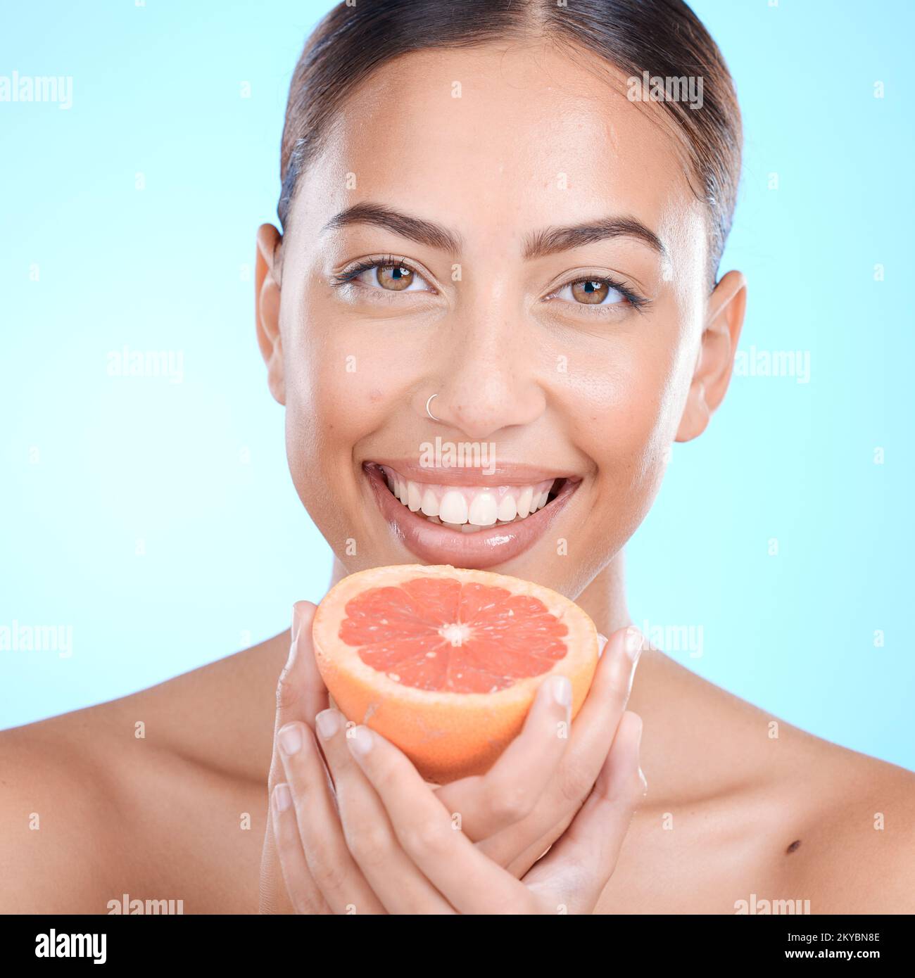 Beauty, grapefruit and portrait of woman with skincare glow, facial treatment and vitamin c food for health detox. Fruit diet product, nutritionist Stock Photo