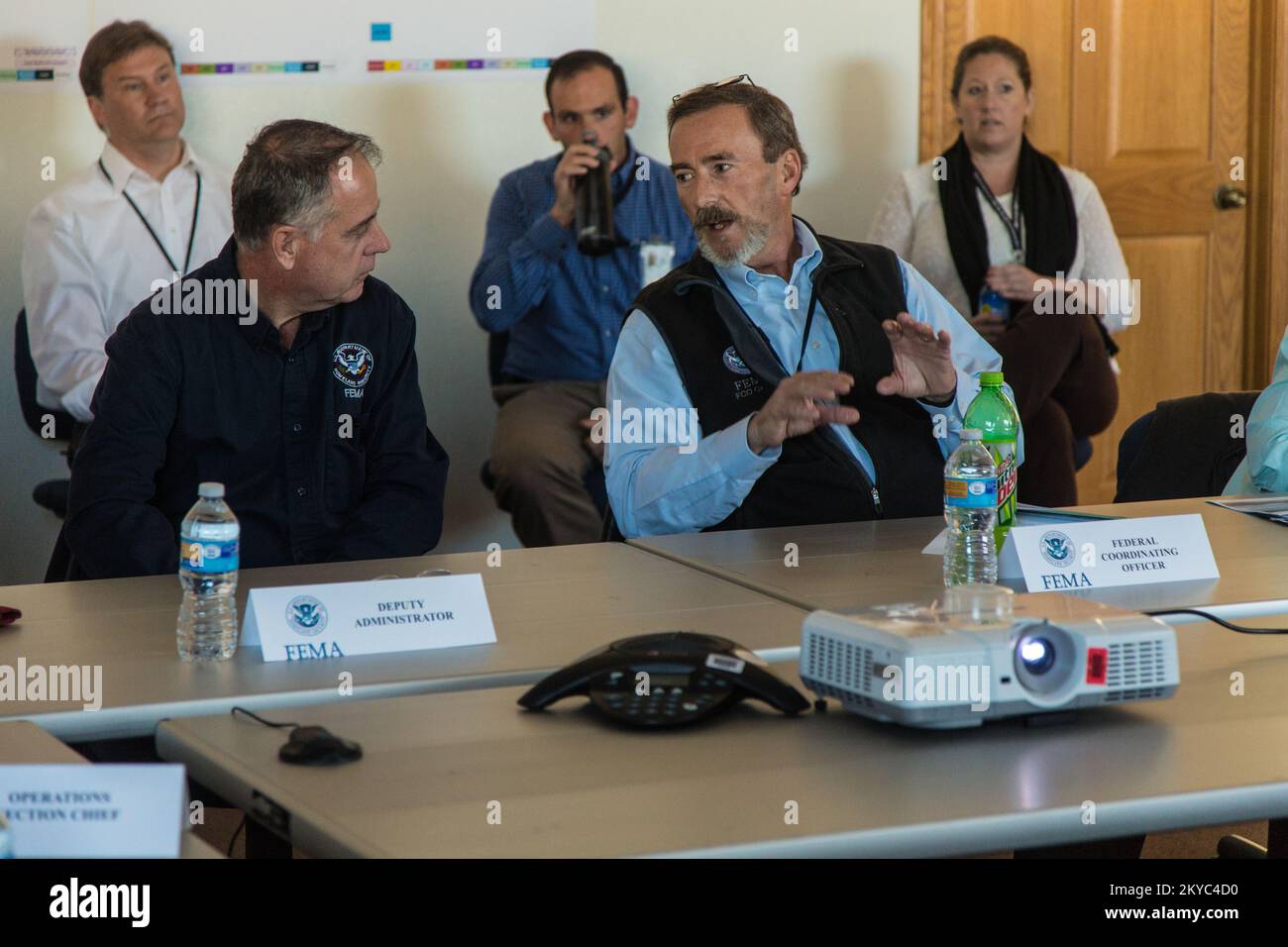 Federal Coordinating Officer Gary Stanley and staff provide a briefing