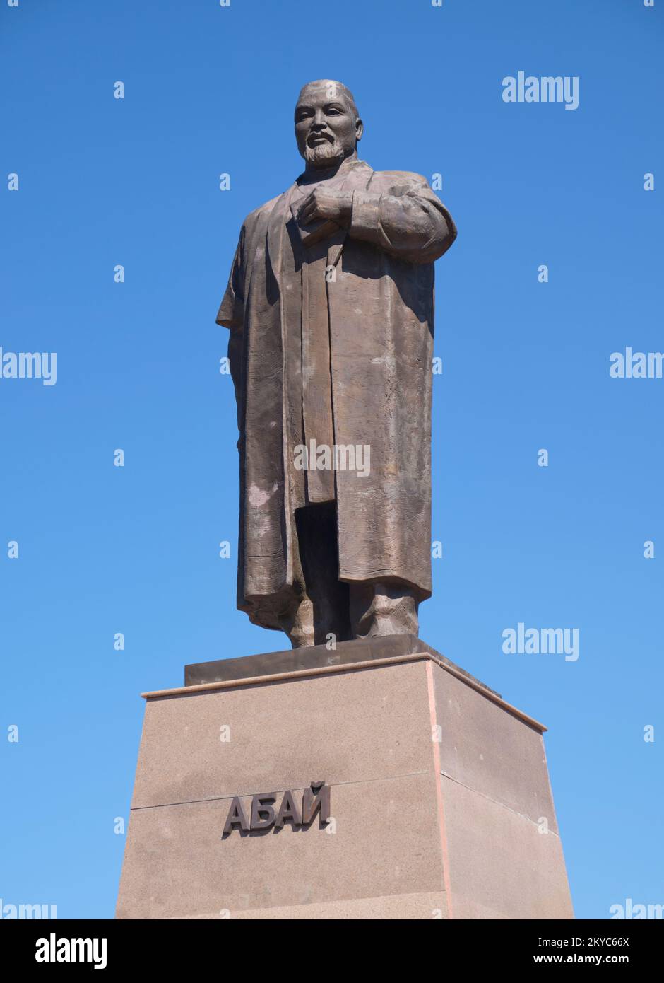 A standing bronze statue of the famous ethnic Kazakh poet, Abai. In Karaganda, Kazakhstan. Stock Photo