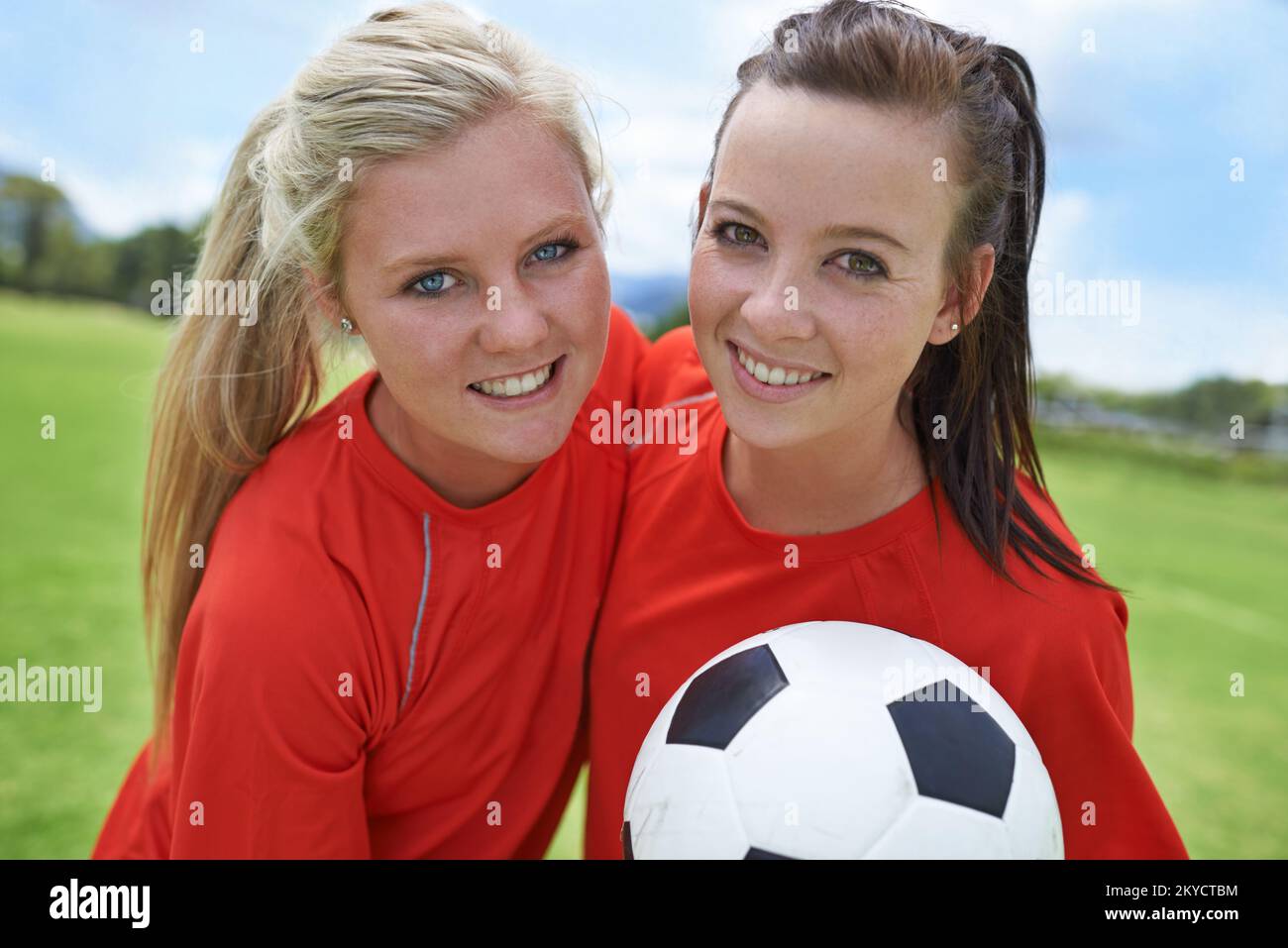 The teams start players. Portrait of two young female soccer players
