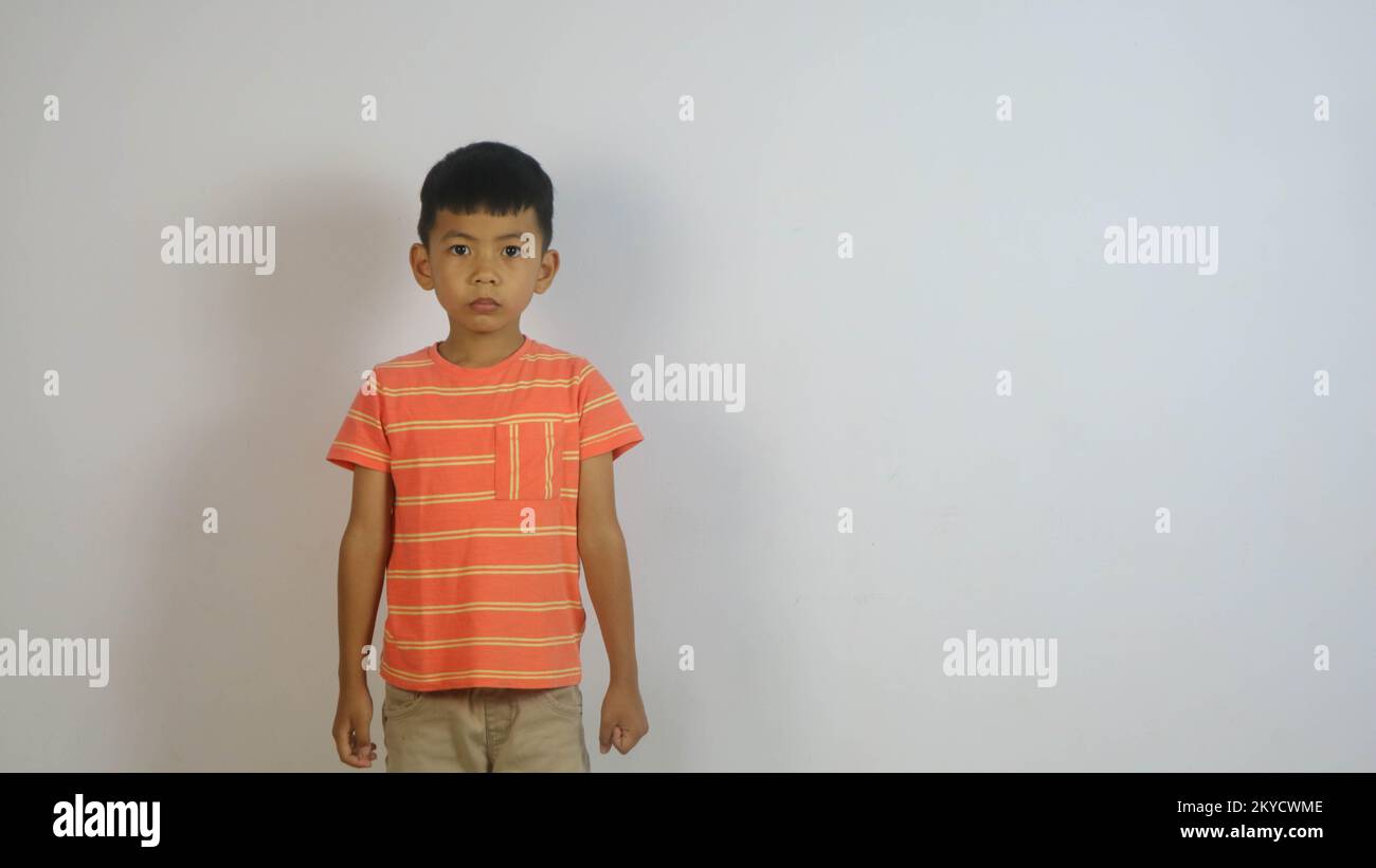 Cute Asian boy isolated on white background Stock Photo - Alamy