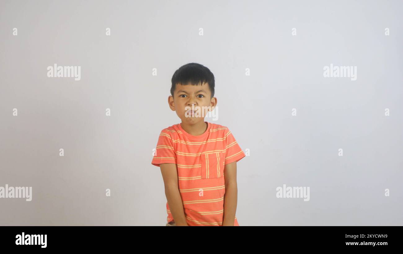 Cute Asian boy isolated on white background Stock Photo - Alamy