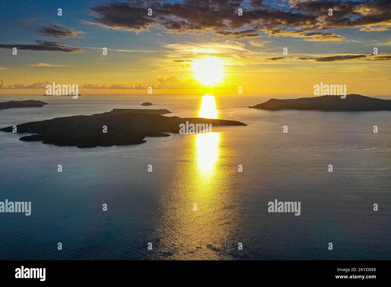 Sunset over the volcanic islands of Santorini, Greece Stock Photo