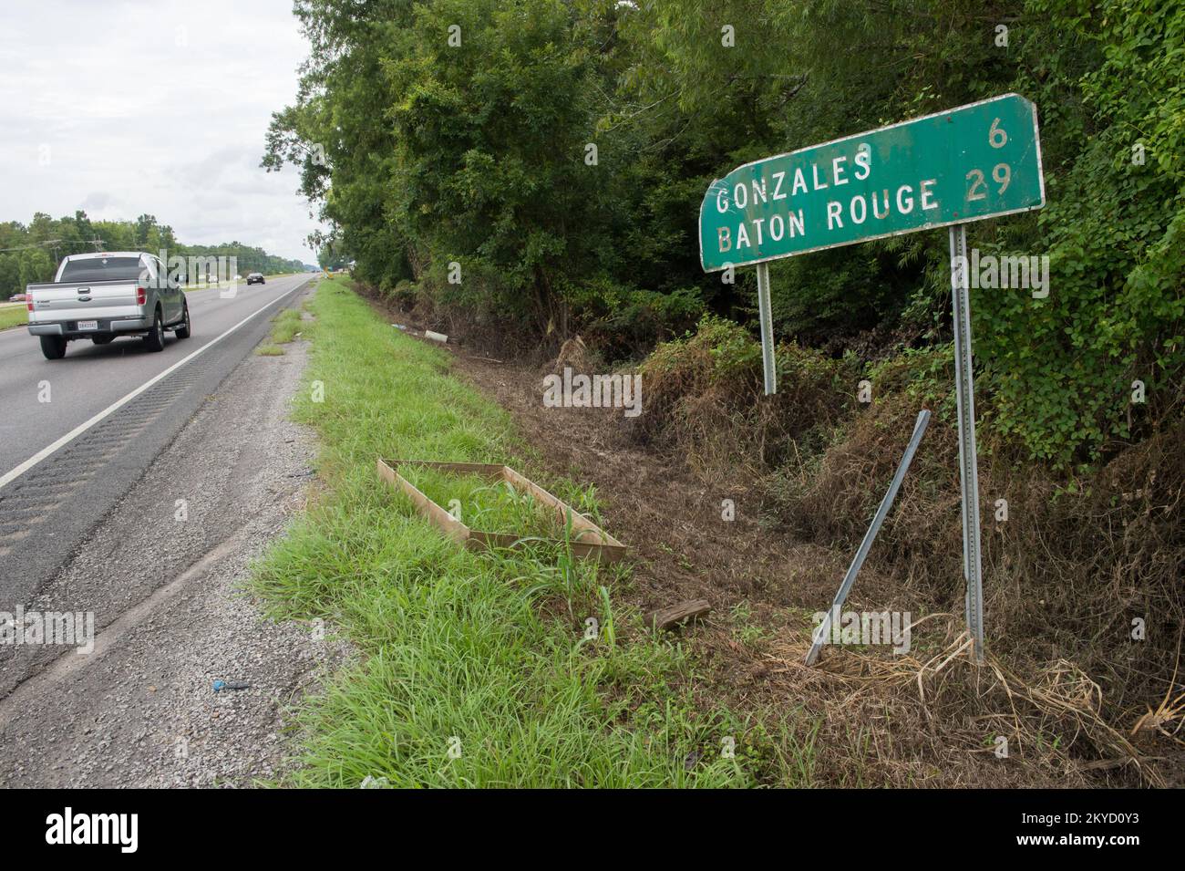 Flood damaged highway sign teetering in Gonzales, La.. Louisiana Severe