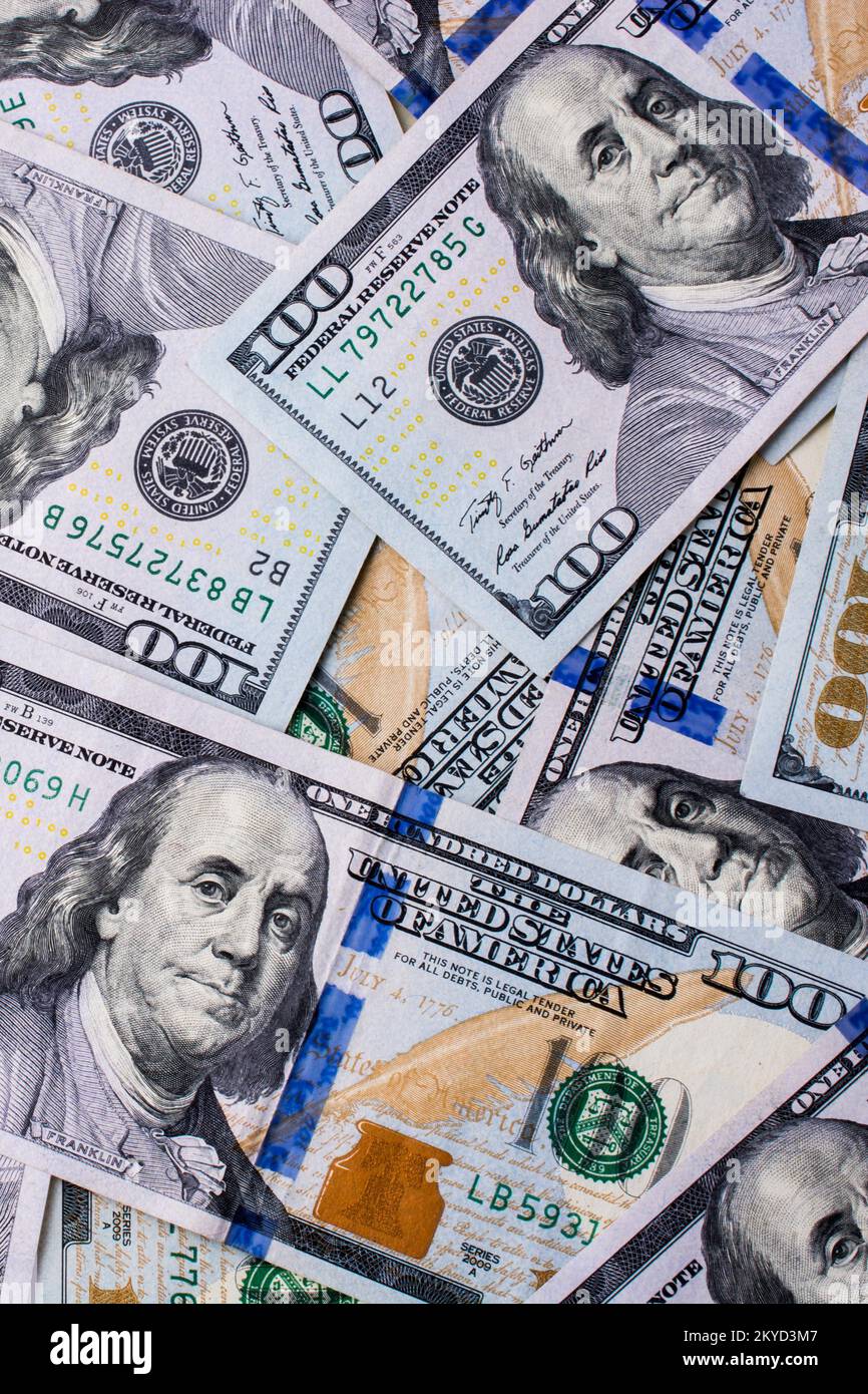 American 100 dollar banknotes made of paper placed on white background