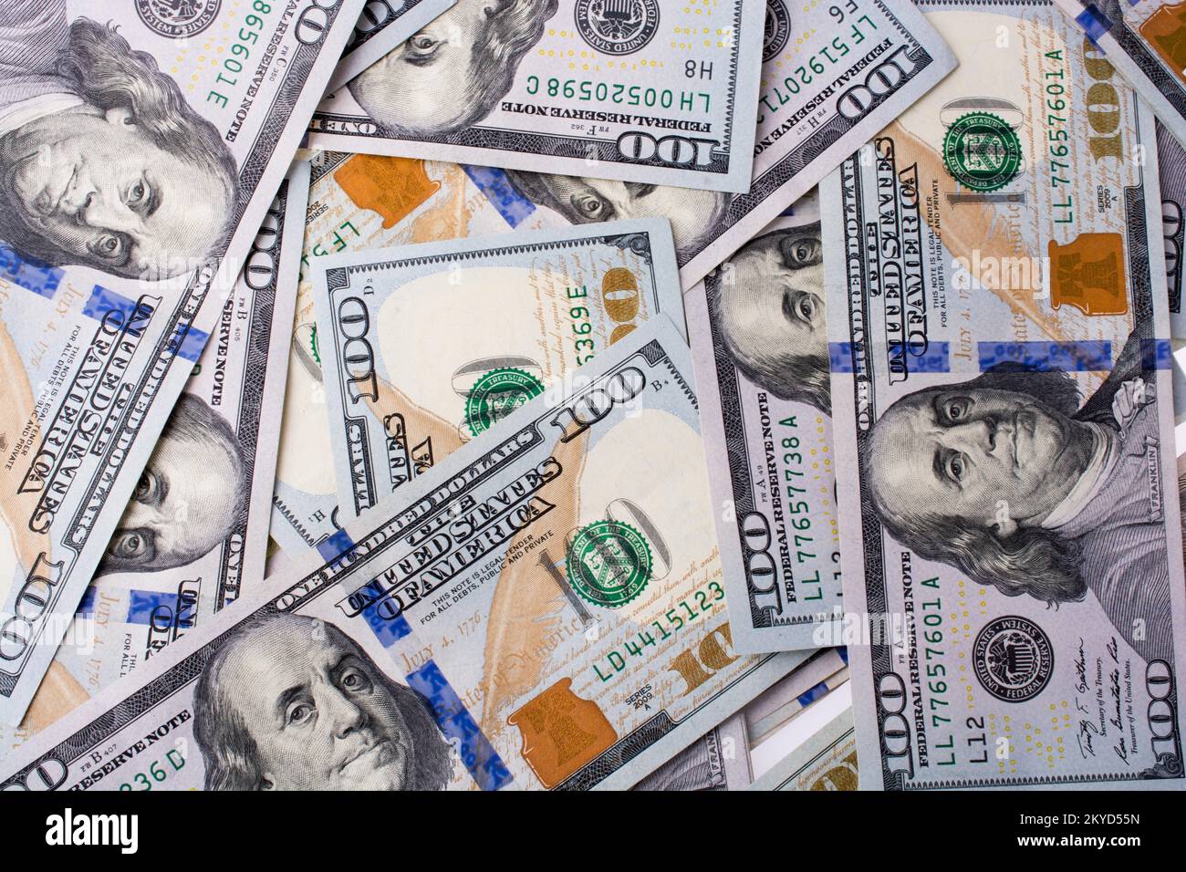 American 100 dollar banknotes made of paper placed on white background