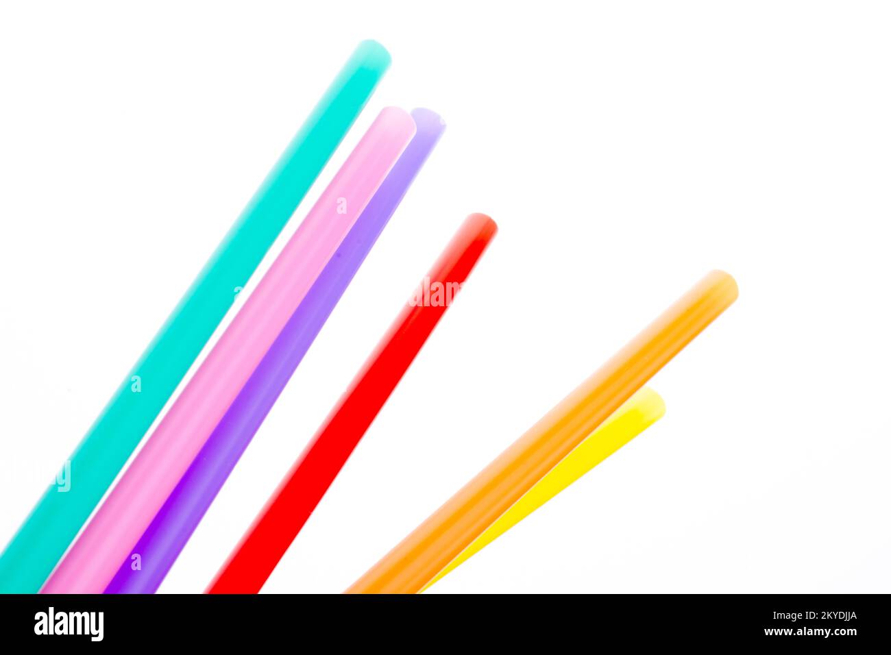 Different color of straw on a white background Stock Photo - Alamy