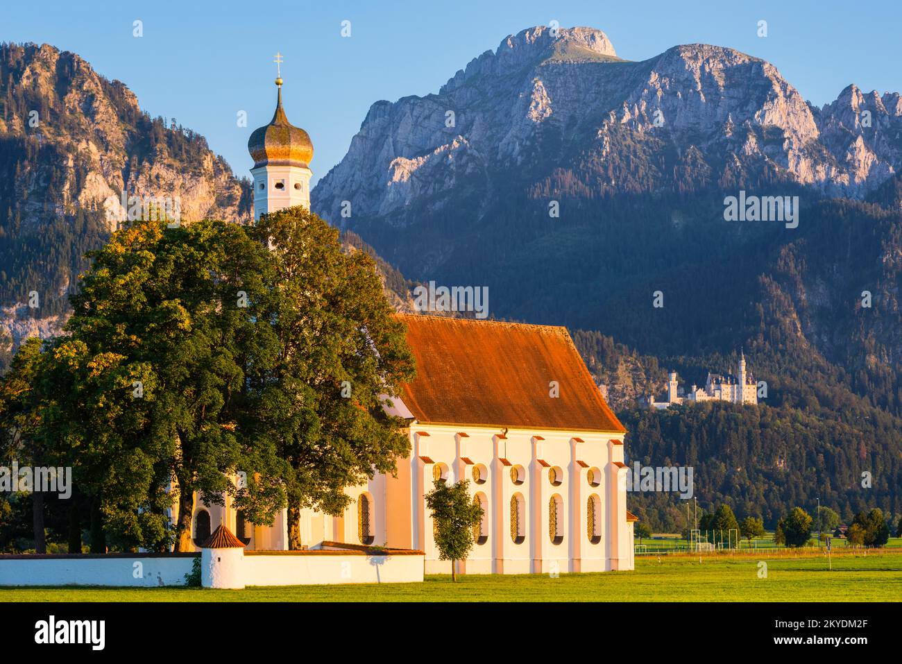 Pilgrimage Church of St. Coloman, behind it Neuschwanstein Castle ...