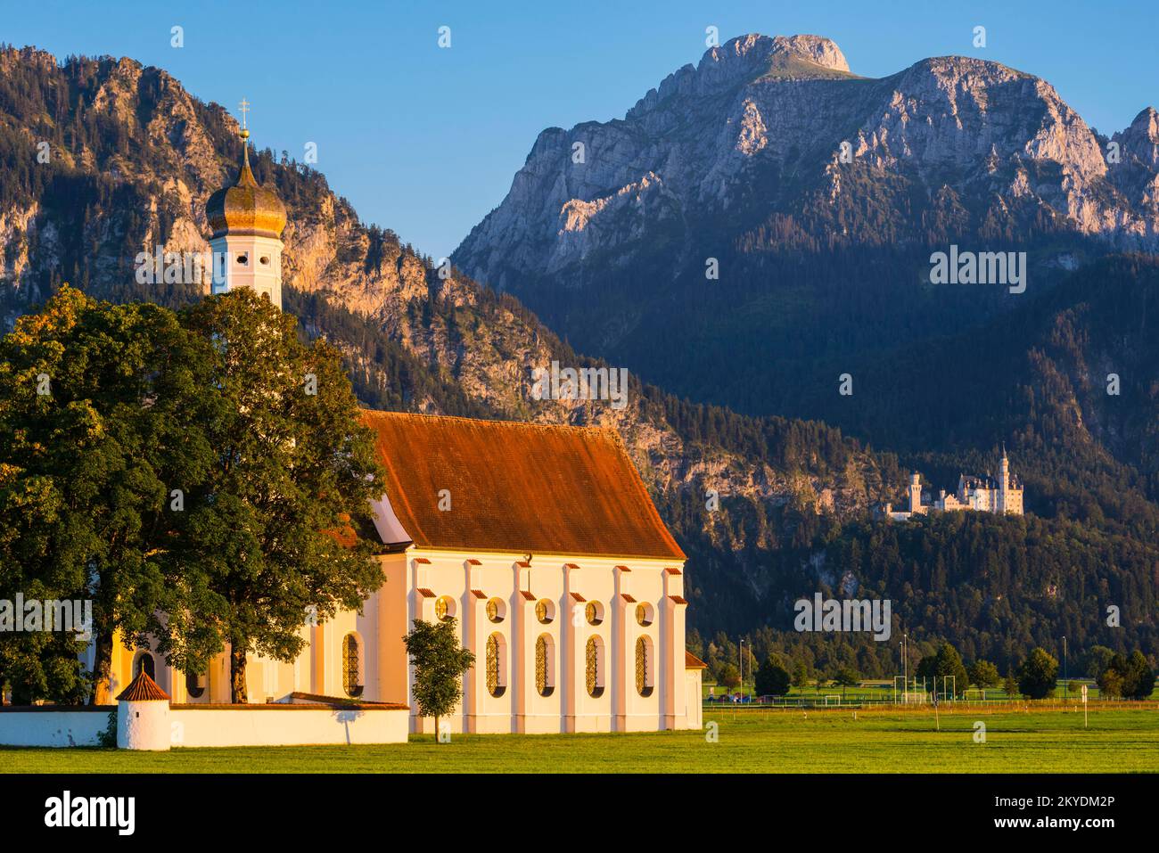 Pilgrimage Church of St. Coloman, behind it Neuschwanstein Castle ...