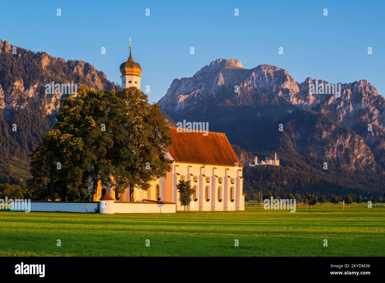 Pilgrimage Church of St. Coloman, behind it Neuschwanstein Castle ...