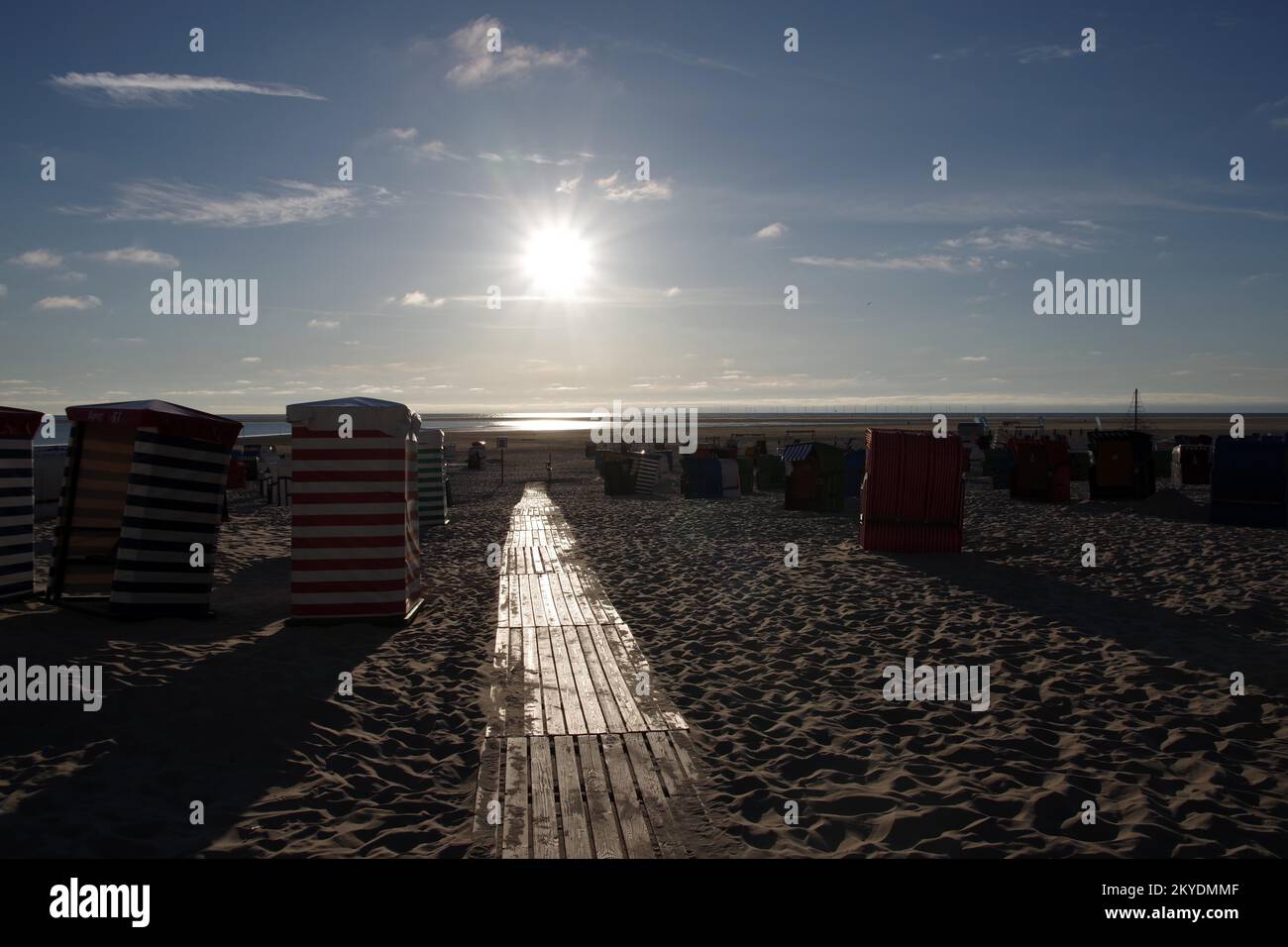 Sand, beach, boards, beach chairs, sky, sun, North Sea, Borkum, Germany, sunset on Borkum beach Stock Photo