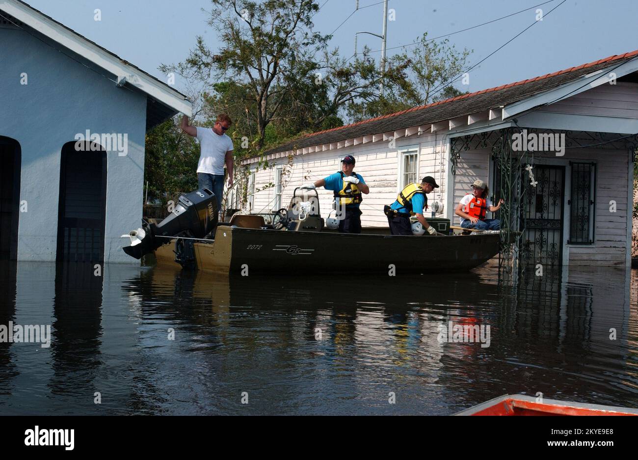 Hurricane Katrina, New Orleans, LA, September 5, 2005 -- Local and FEMA Urban Search and Rescue workers and US Coast Guard members search for residents needing assistance in areas impacted by Hurricane Katrina. Jocelyn Augustino/FEMA Stock Photo