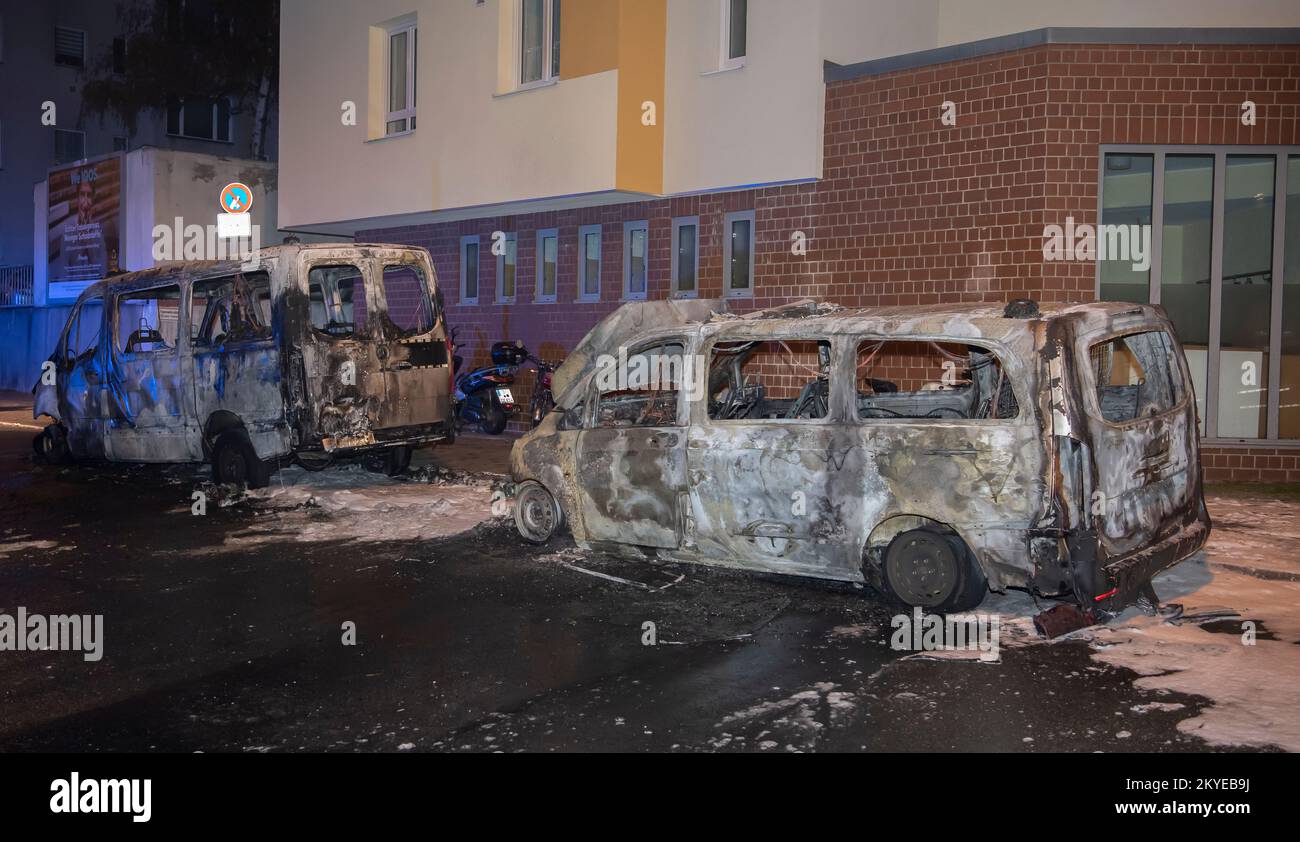Berlin, Germany. 01st Dec, 2022. Two burnt-out police cars are parked at police station 55. In the early hours of the morning, two police cars in Berlin-Neukölln were allegedly set on fire. Credit: Paul Zinken/dpa/Alamy Live News Stock Photo