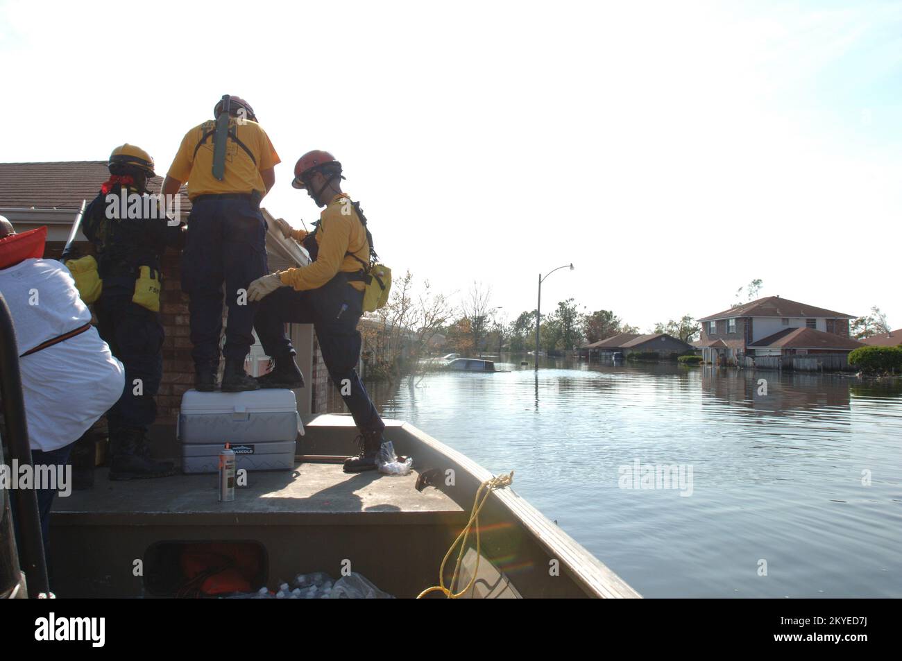 Hurricane Katrina, New Orleans, LA, September 6, 2005 -- FEMA Urban Search and Rescue workers prepare to go on top of a roof in a neighborhood impacted by Hurricane Katrina. Jocelyn Augustino/FEMA Stock Photo