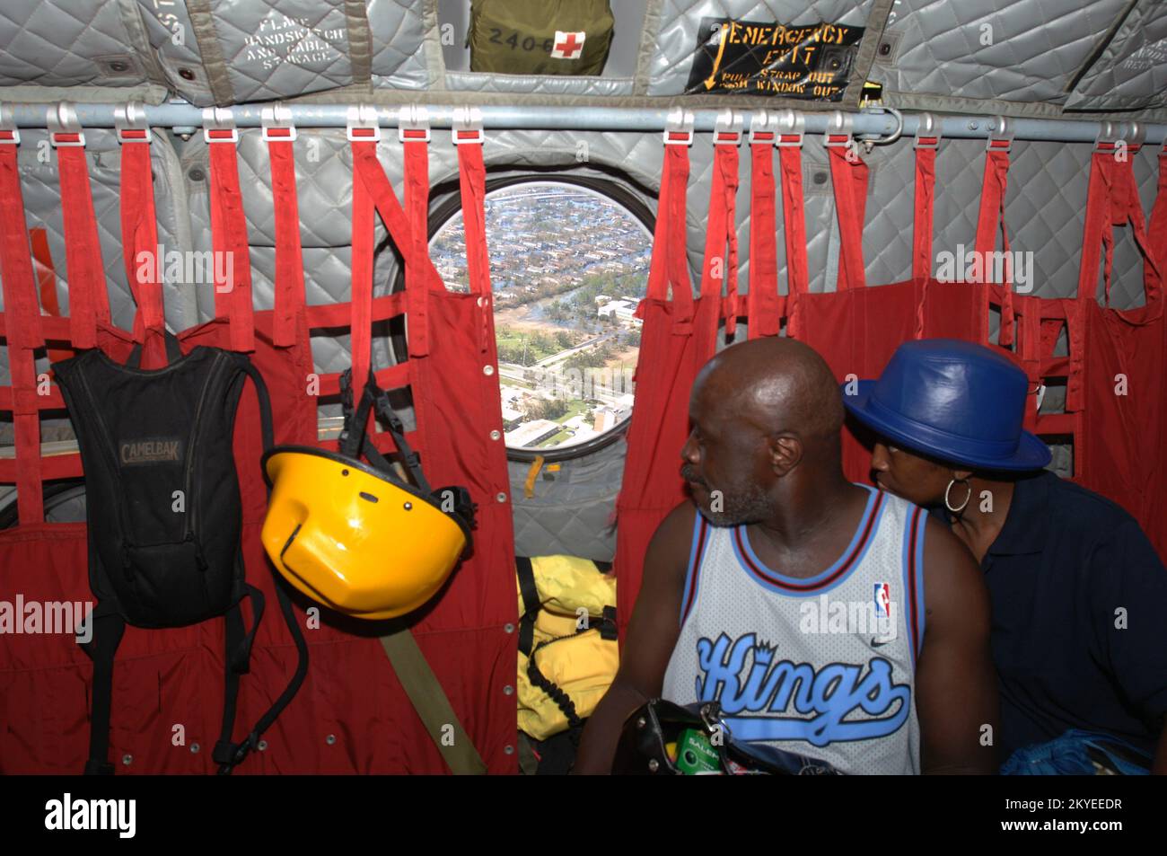 https://c8.alamy.com/comp/2KYEEDR/hurricane-katrina-new-orleans-la-september-7-2005-a-couple-stranded-by-hurricane-katriana-and-found-by-a-fema-urban-search-and-rescue-team-look-out-the-window-of-a-chinook-helicopter-at-the-damage-caused-by-hurricane-jocelyn-augustinofema-2KYEEDR.jpg