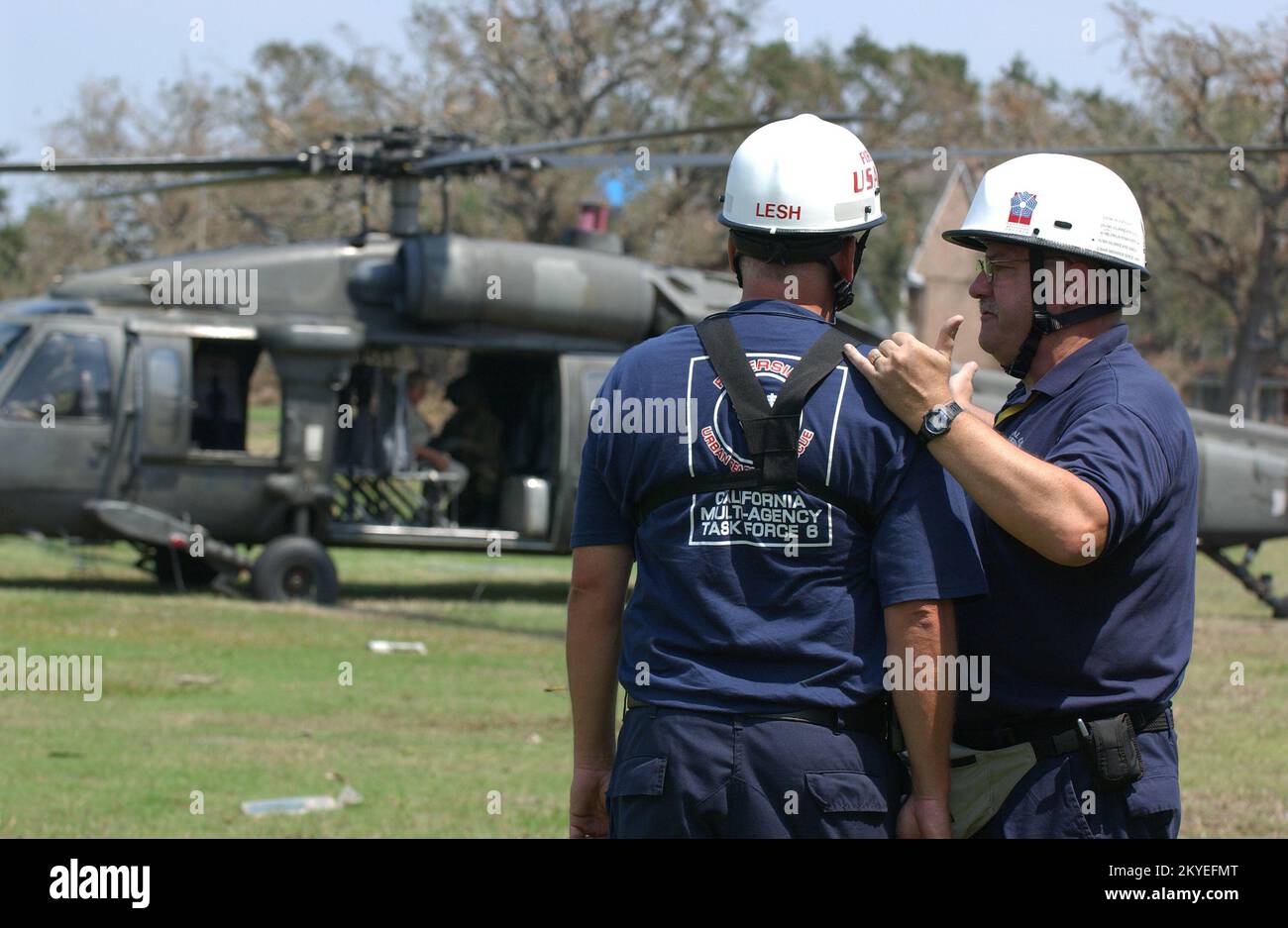 Hurricane Katrina, New Orleans, LA, September 9, 2005 -- FEMA Urban Search and Rescue workers discuss rescue operations in areas impacted by Hurricane Katrina. Jocelyn Augustino/FEMA Stock Photo