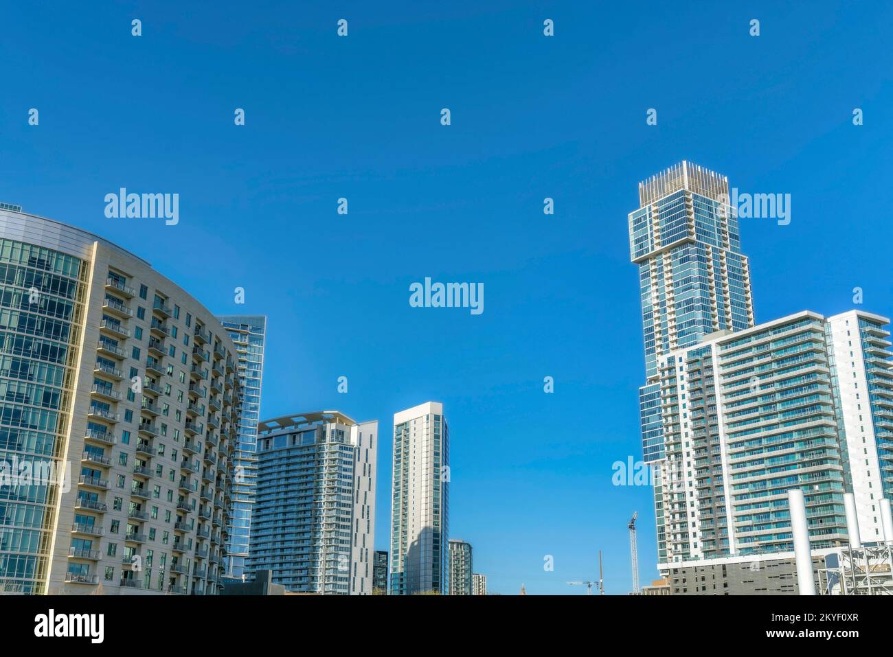 Austin Texas skyline with exterior view of luxury apartments against ...