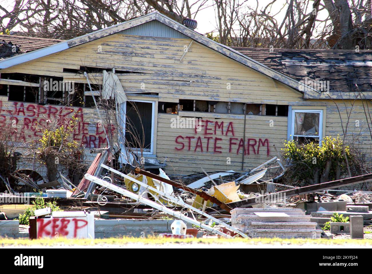 Hurricane Katrina] Buras, LA, October 25, 2005 - The eye of Hurricane  Katrina passed directly over this community. The water tower rests on top  of a house in the ruins of Plaquemine