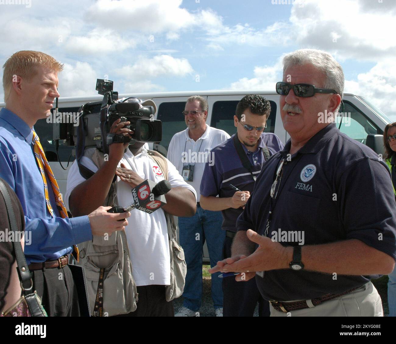 Hurricane Katrina, Purvis, MS., July 28, 2006 - Mike Miller, FEMA emergency housing unit supervisor, fields media questions at the travel trailer/mobile home staging area. Michelle Miller-Freeck/FEMA Stock Photo