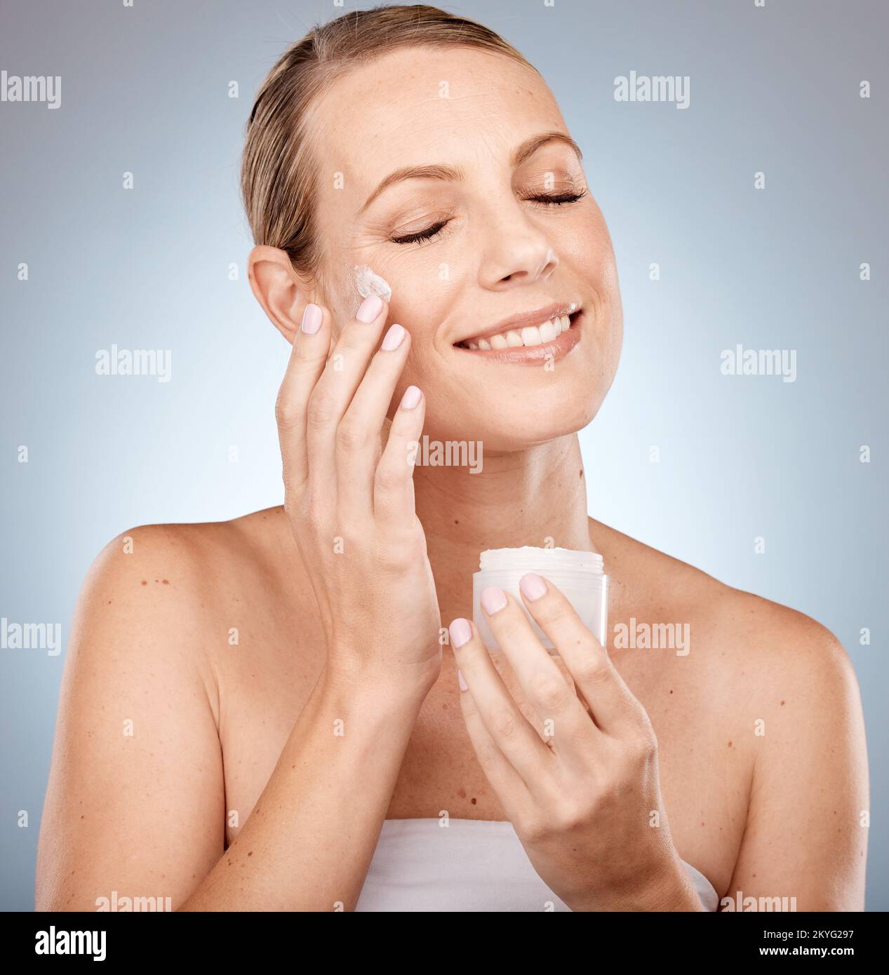 Woman sun cream face hi-res stock photography and images - Alamy