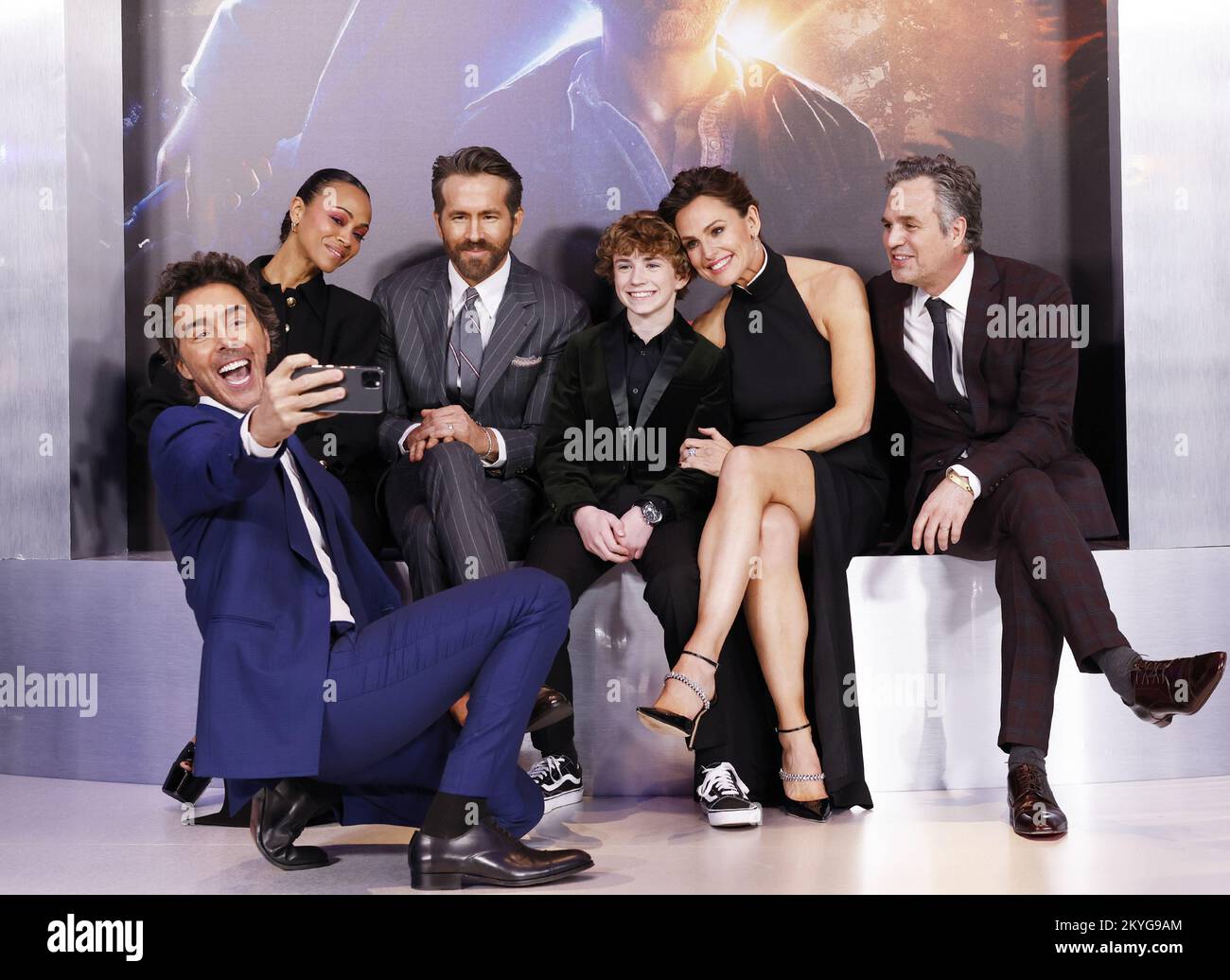 New York, United States. 28th Feb, 2022. Shawn Levy takes a selfie with Zoe Saldana, Ryan Reynolds, Walker Scobell, Jennifer Garner, and Mark Ruffalo on the red carpet at the Netflix World Premiere of 'The Adam Project' at Alice Tully Hall/Lincoln Center in New York City on Monday, February 28, 2022. Photo by John Angelillo/UPI Credit: UPI/Alamy Live News Stock Photo