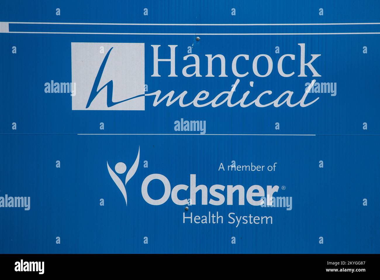 Bay Saint Louis, MS, May 22, 2015 - Signage for Hancock Medical Center, Bay Saint Louis, Mississippi. Established in 1960 as the Hancock General hospital, the hospital eventually evolved into the Hancock Medical Center. The medical center is currently a member of the Ochsnper Health System and serves a population of over 44,000 residents in Hancock County. The medical center was severely damaged by Hurricane Katrina in 2005. The Hancock Medical Center was restored with public assistance and mitigation assistance from FEMA. Stock Photo