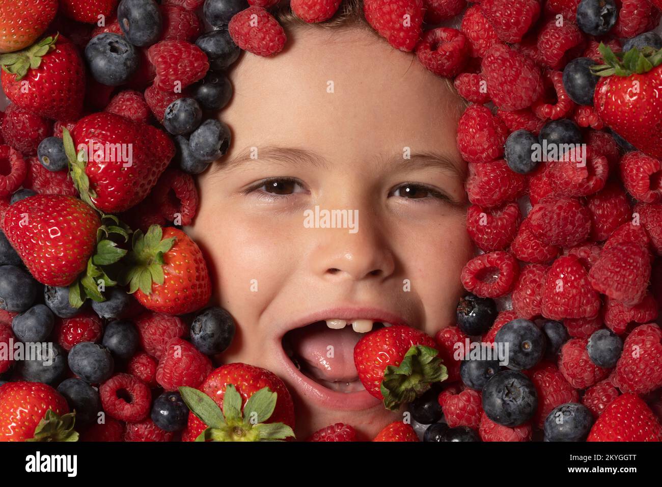 Healthy eating for children. Mix of strawberry, blueberry, raspberry, blackberry background