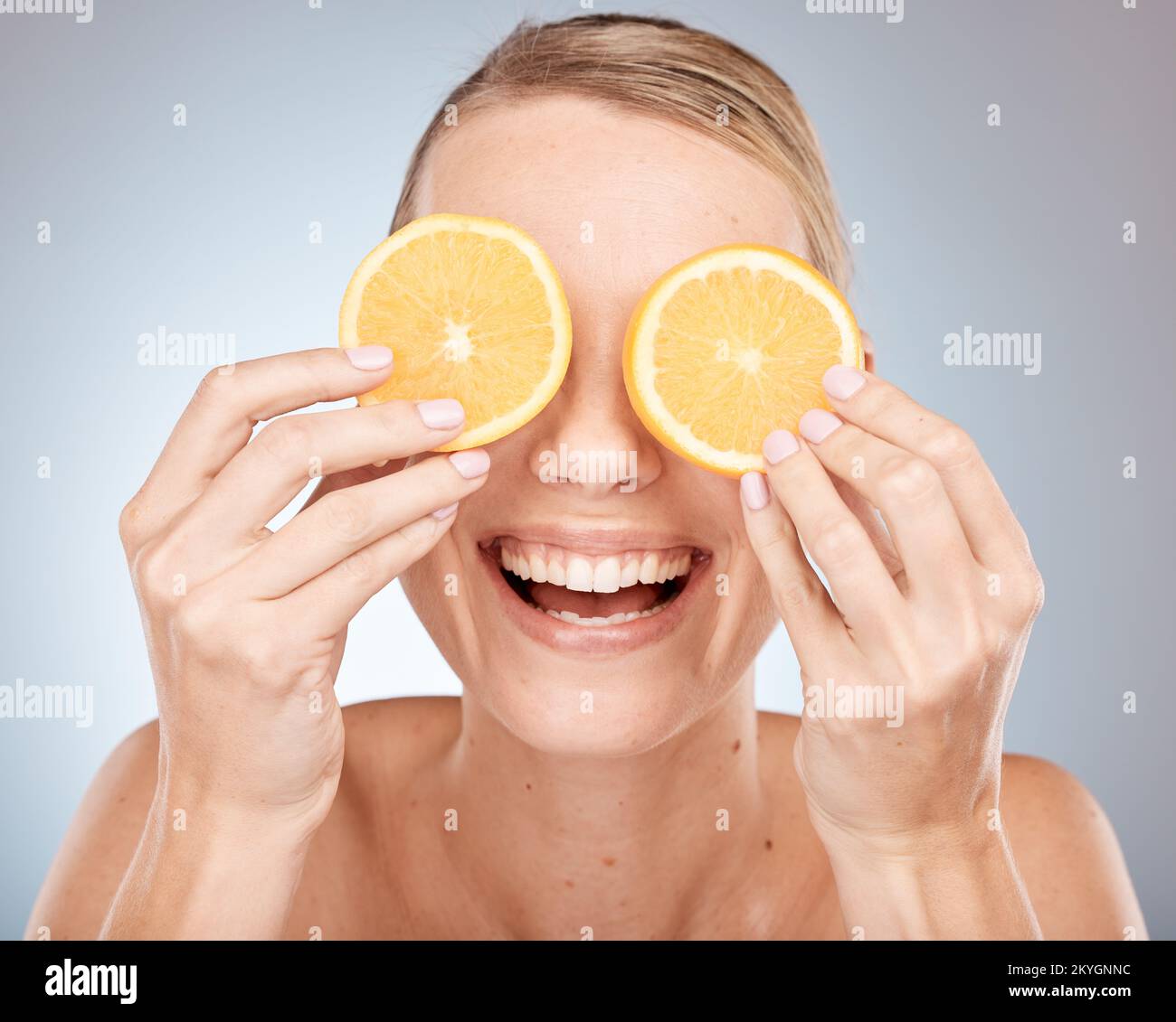 Lemon, eyes and skincare woman in studio for cosmetics, makeup and