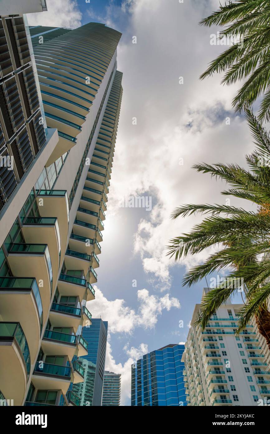 High-rise condominium buildings in a low angle view under the sun ...