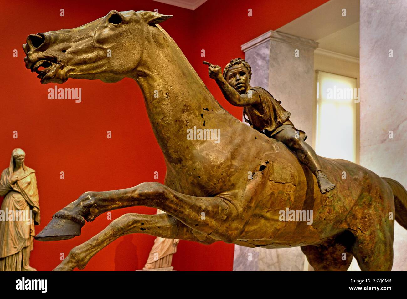 The Jockey of Artemision  large Hellenistic bronze statue, young boy riding a horse, dated to around 150–140 BC,  bronze statue from Ancient Greece , Greek sculpture of a racehorse, saved from destruction when it was lost in a shipwreck in antiquity,  discovered in the twentieth century, Dedicated to the gods.  National Archaeological Museum in Athens. Stock Photo