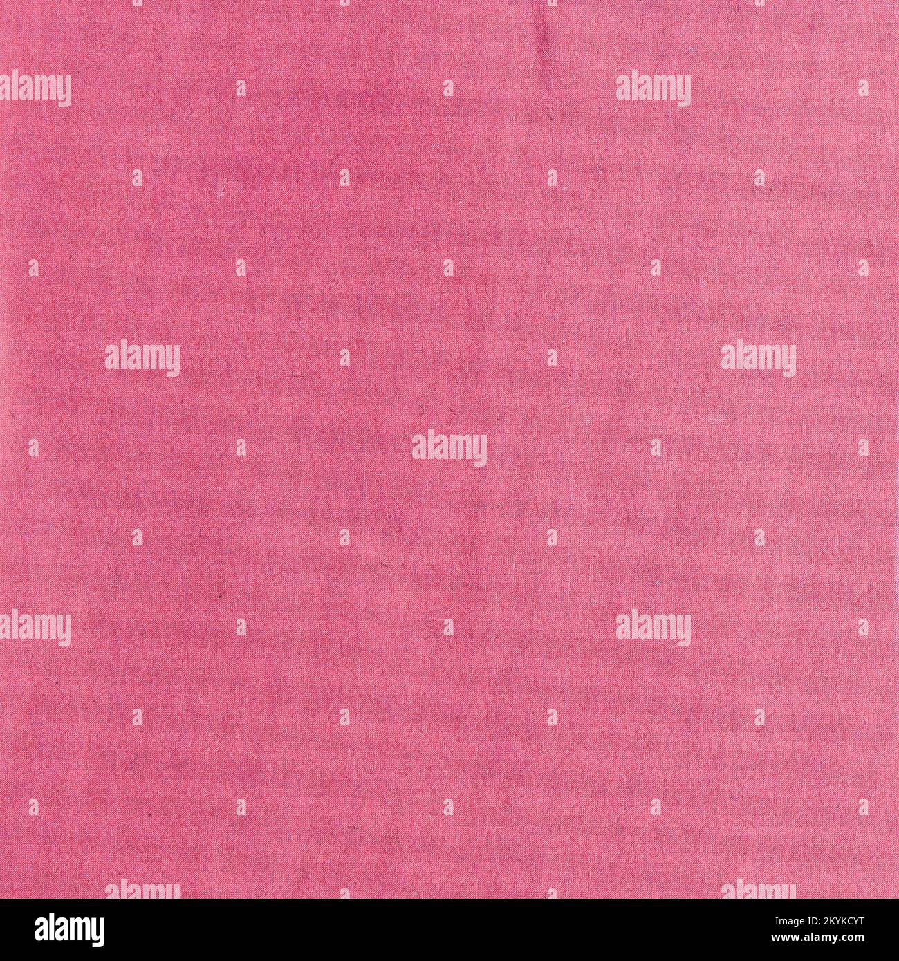 Used newspaper texture grange effect. Textured pink paper sheet Stock Photo