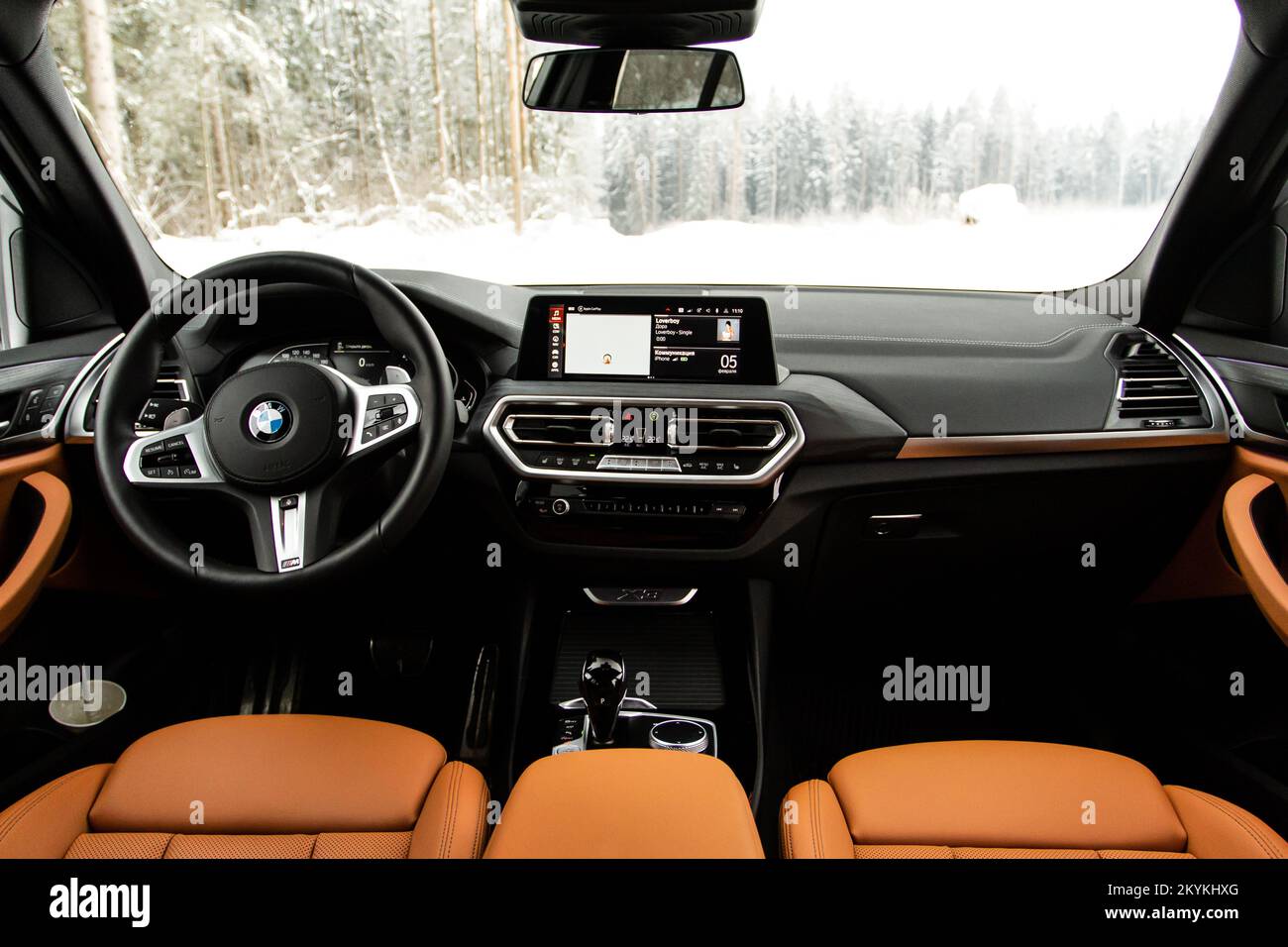 MOSCOW, RUSSIA - FEBRUARY 05, 2022. BMW X3 (G01), interior view. Compact luxury crossover SUV. Central console of the new BMW iDrive. Stock Photo
