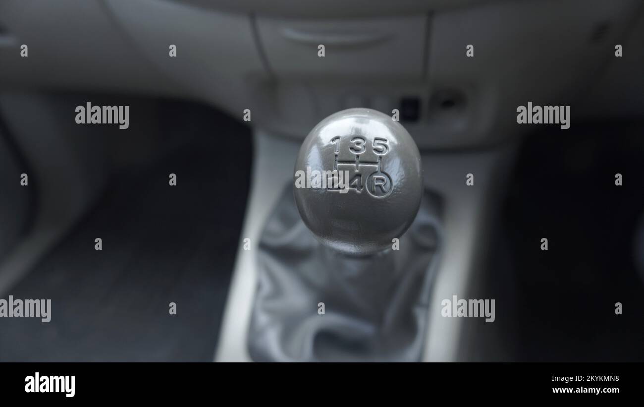 Close up the hand holding the car gear switch vehicle part Stock Photo