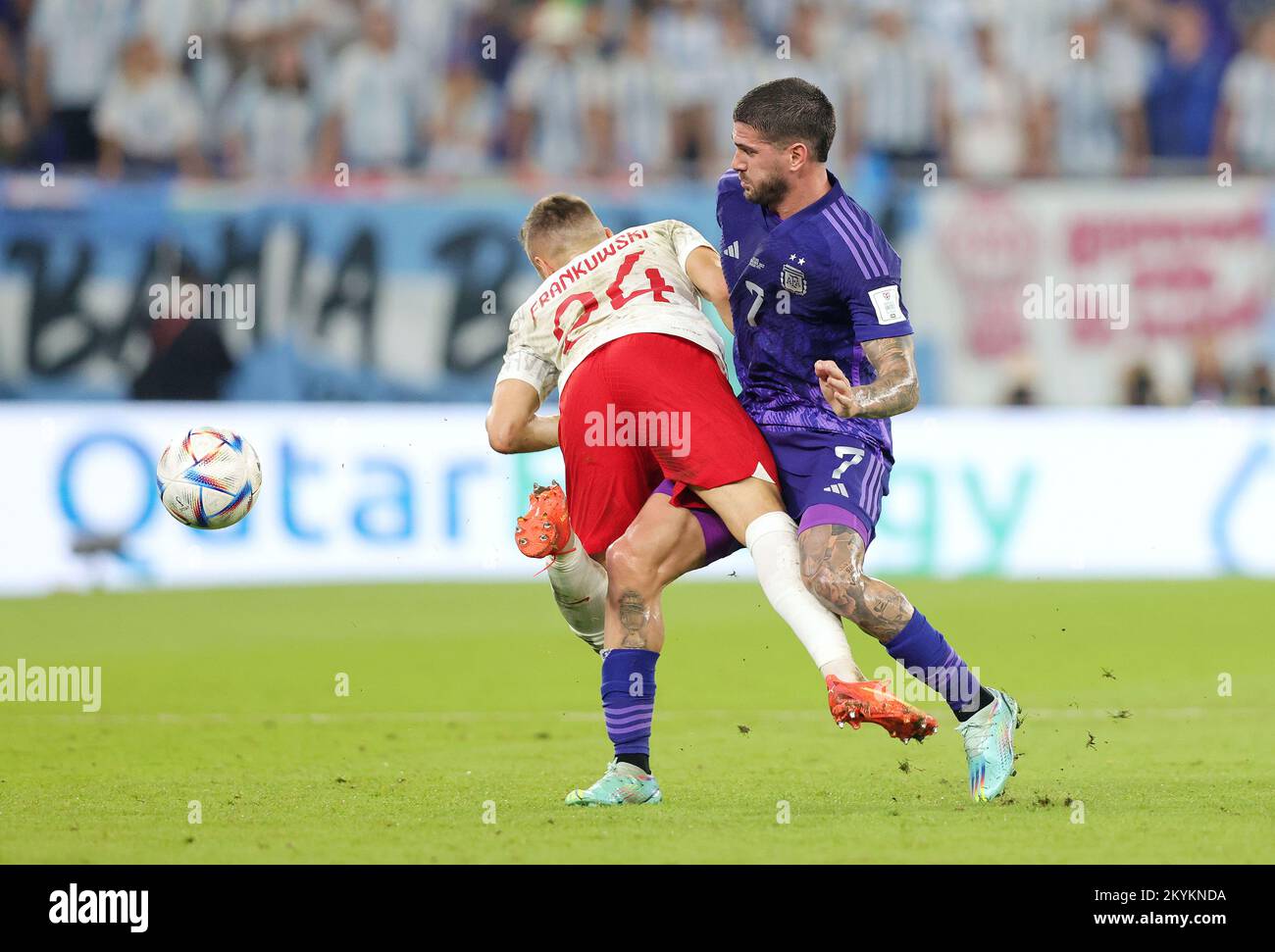przemyslaw-frankowski-of-poland-is-fouled-by-rodrigo-de-paul-of