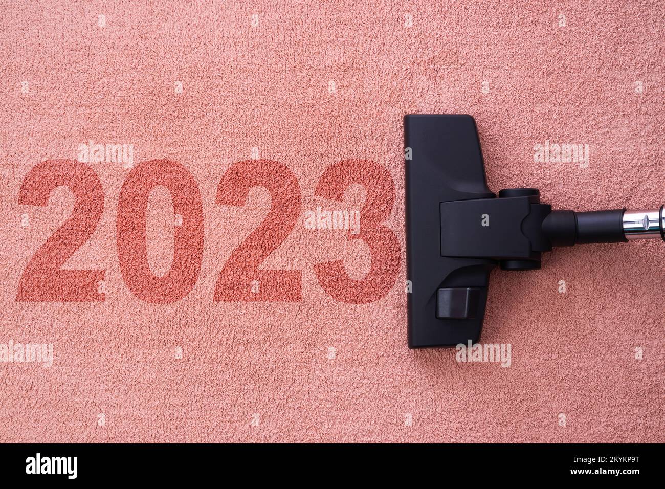 Refreshing in the New year 2023 concept for cleaning home cleaning with vacuum cleaner on carpet and copy space for a text Stock Photo