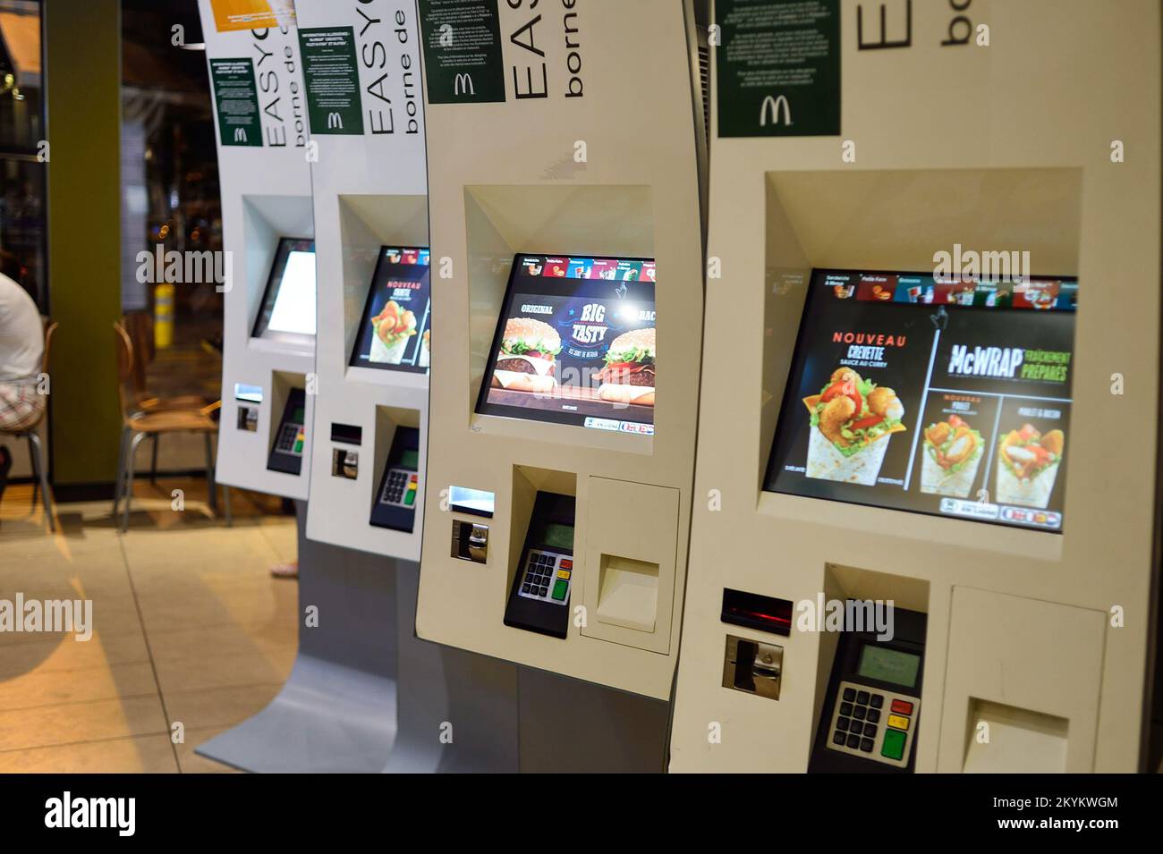 PARIS, FRANCE - AUGUST 10, 2015: McDonald's restaurant interior. McDonald's is the world's largest chain of hamburger fast food restaurants, founded i Stock Photo