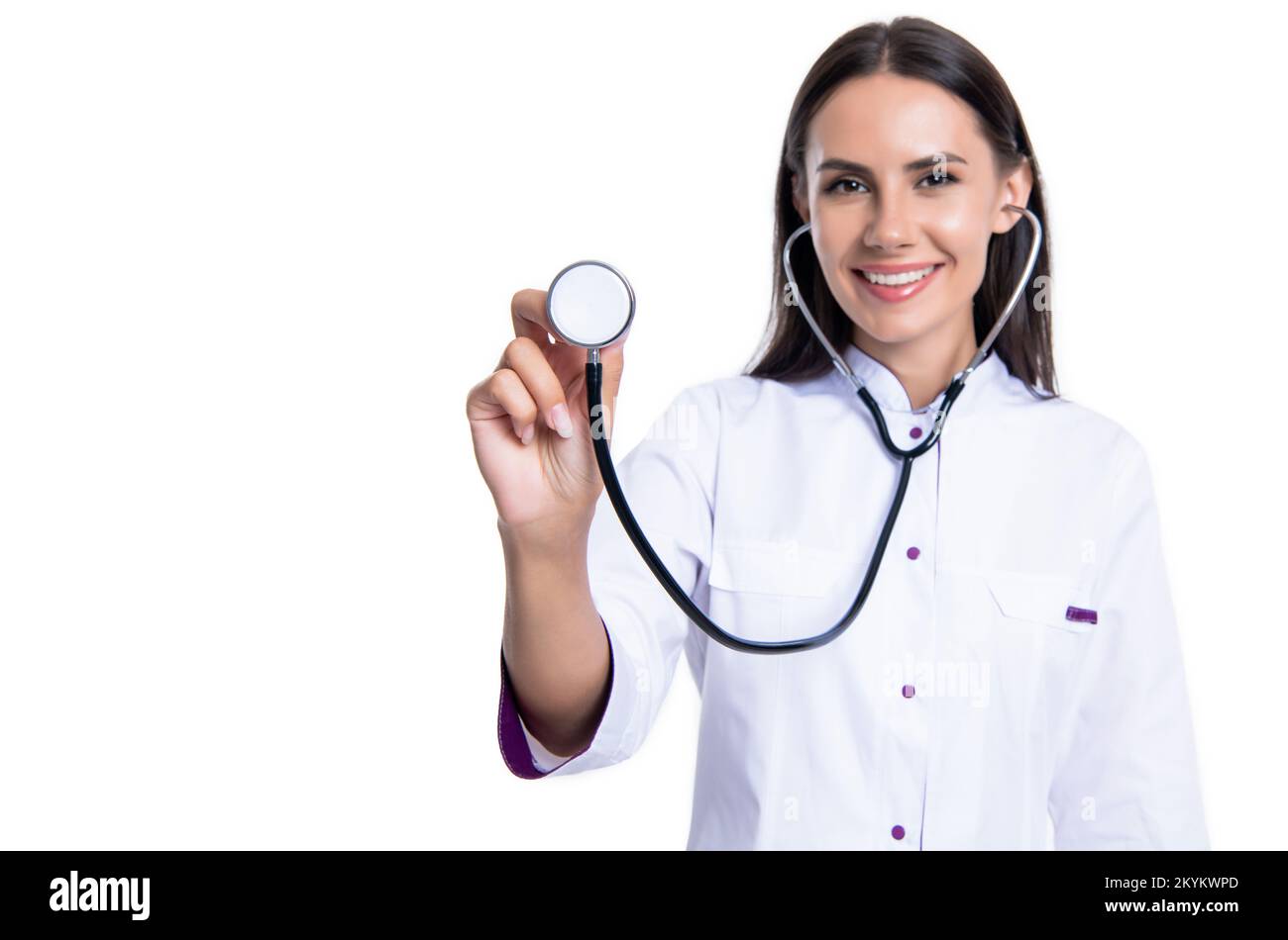 selective focus of happy cardiologist with heartbeat in stethoscope at studio. stethoscope Stock