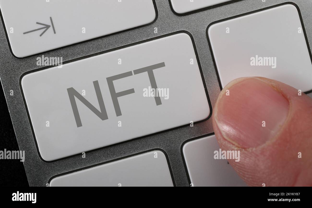 A man looking for an NFT (non transferable token) online. Stock Photo