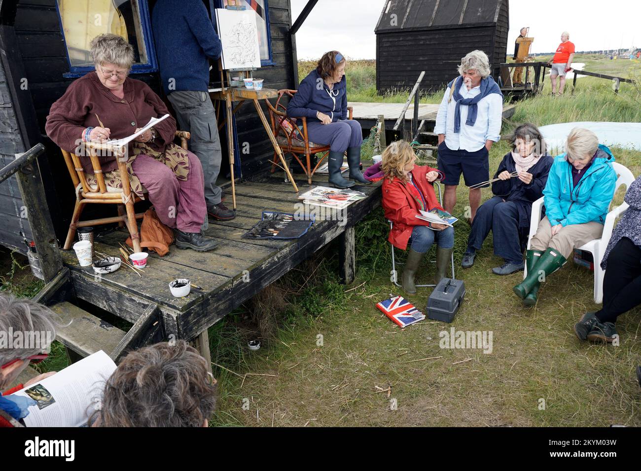 group of bungay black dog art club artists painting at walberswick suffolk england Stock Photo