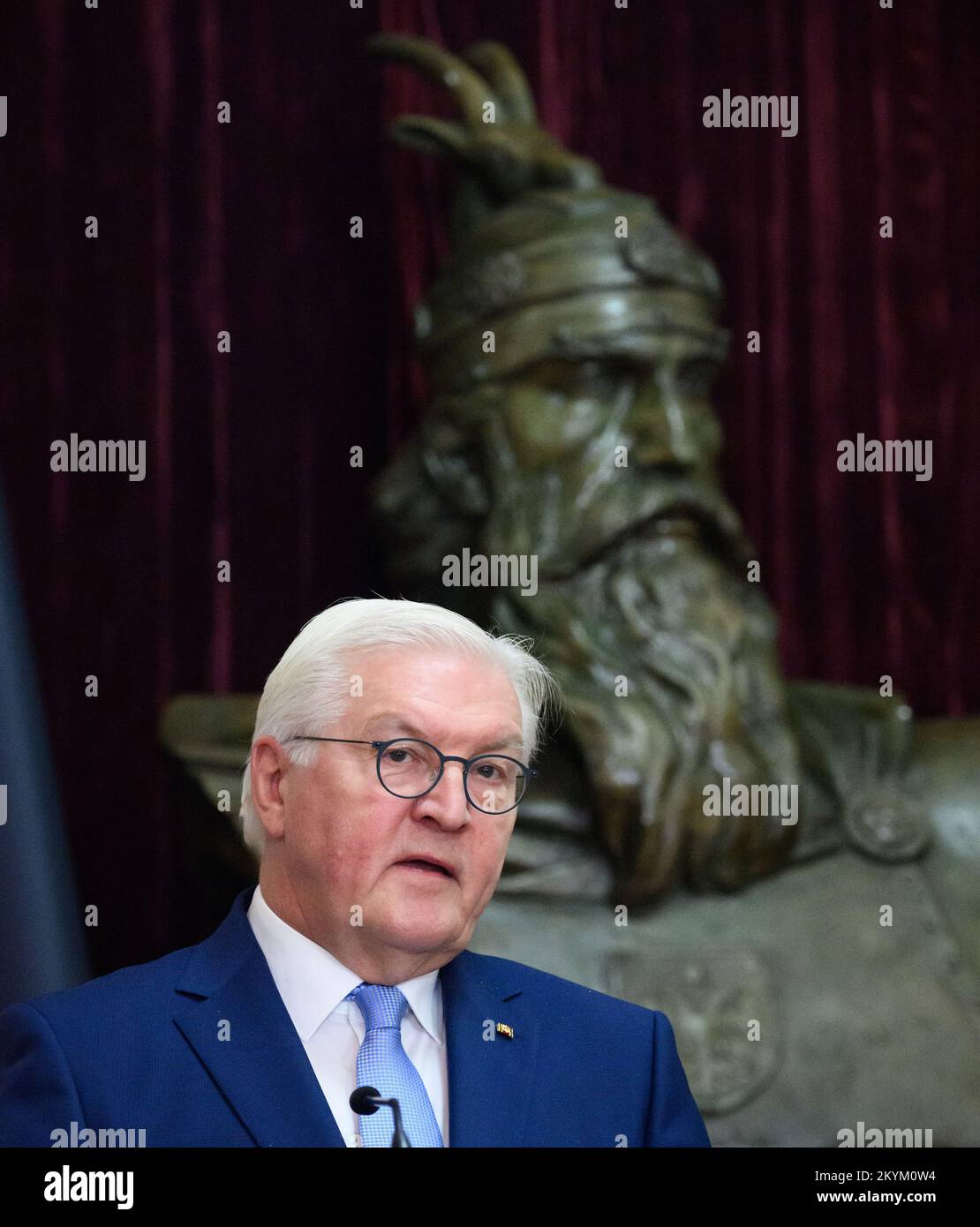 01 December 2022, Albania, Tirana: German President Frank-Walter Steinmeier speaks in front of a bust of Prince George Kastriota, known as Skanderbeg, at a press conference after his talks with the President of Albania, Begaj, at the President's official residence. President Steinmeier is visiting the countries of northern Macedonia and Albania during his four-day trip to the Balkans. In addition to the situation in the region and the effects of Russia's war of aggression in Ukraine, the trip will focus on Germany's support for the countries' prospects of joining the European Union. Photo: Ber Stock Photo