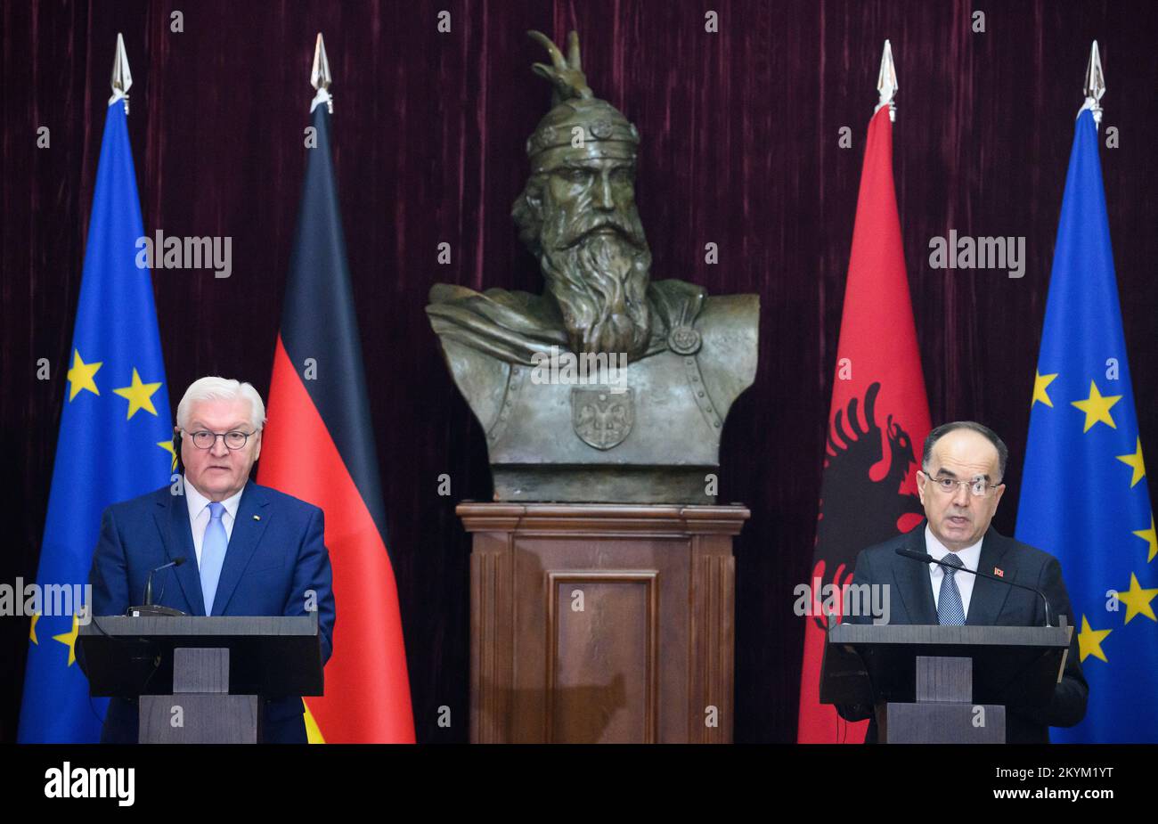 01 December 2022, Albania, Tirana: German President Frank-Walter Steinmeier (l) and Bajram Begaj, President of Albania, make remarks during a press conference after their talks at the President's official residence. Between them is the bust of Prince George Kastriota, known as Skanderbeg. President Steinmeier is visiting the countries of northern Macedonia and Albania during his four-day trip to the Balkans. In addition to the situation in the region and the effects of the Russian war of aggression in Ukraine, Germany's support for the countries' prospects of joining the European Union is the Stock Photo