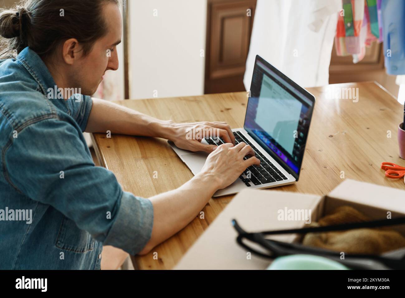 Man working on laptop Stock Photo
