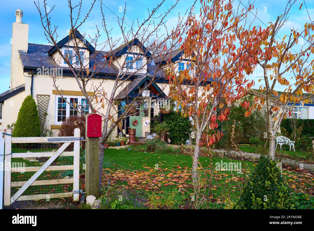 Rural cottage  on a sunny day in autumn Stock Photo