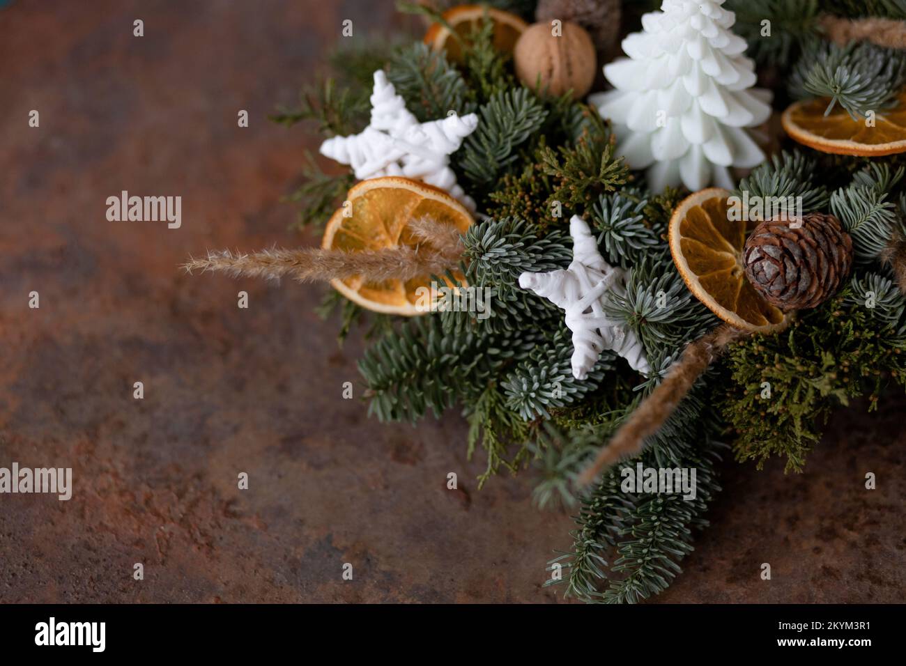 Christmas composition on a rusty brown background. Close-up, place for text Stock Photo
