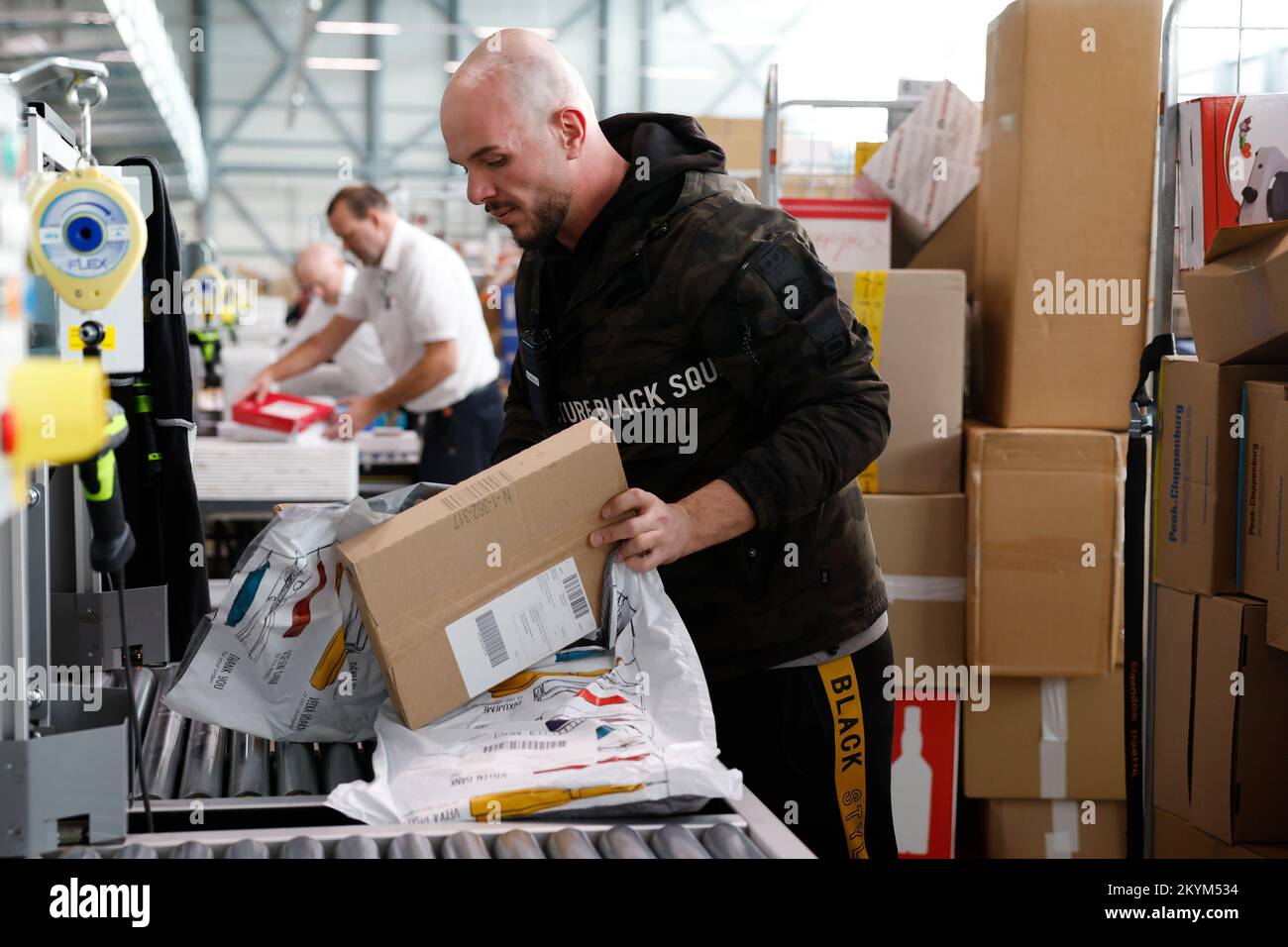 WESTZAAN Employees of post and parcel delivery company PostNL sort
