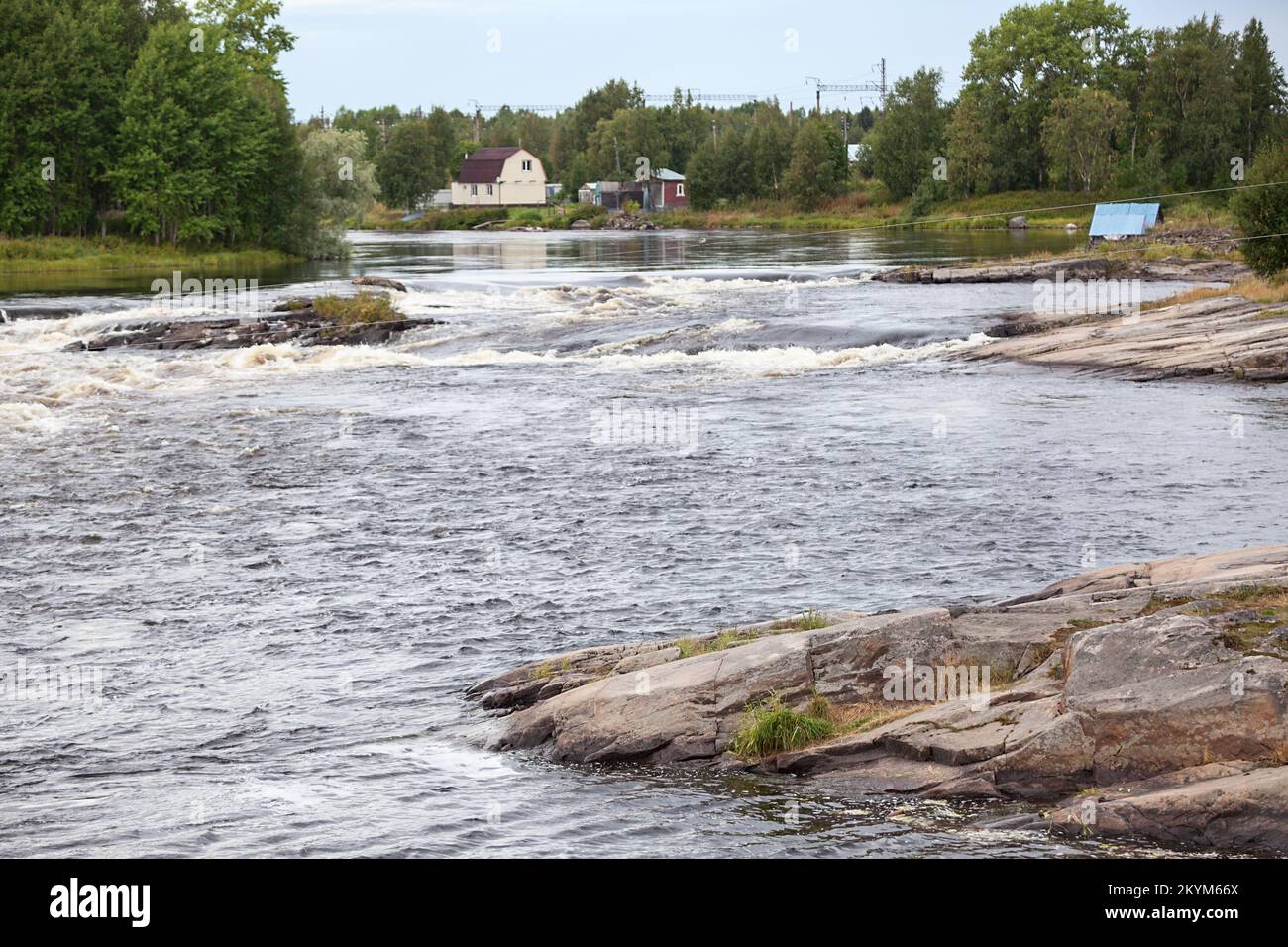 The Nizhny Vyg River flows among the rocky banks. City of Belomorsk, Karelia, northern Russia Stock Photo