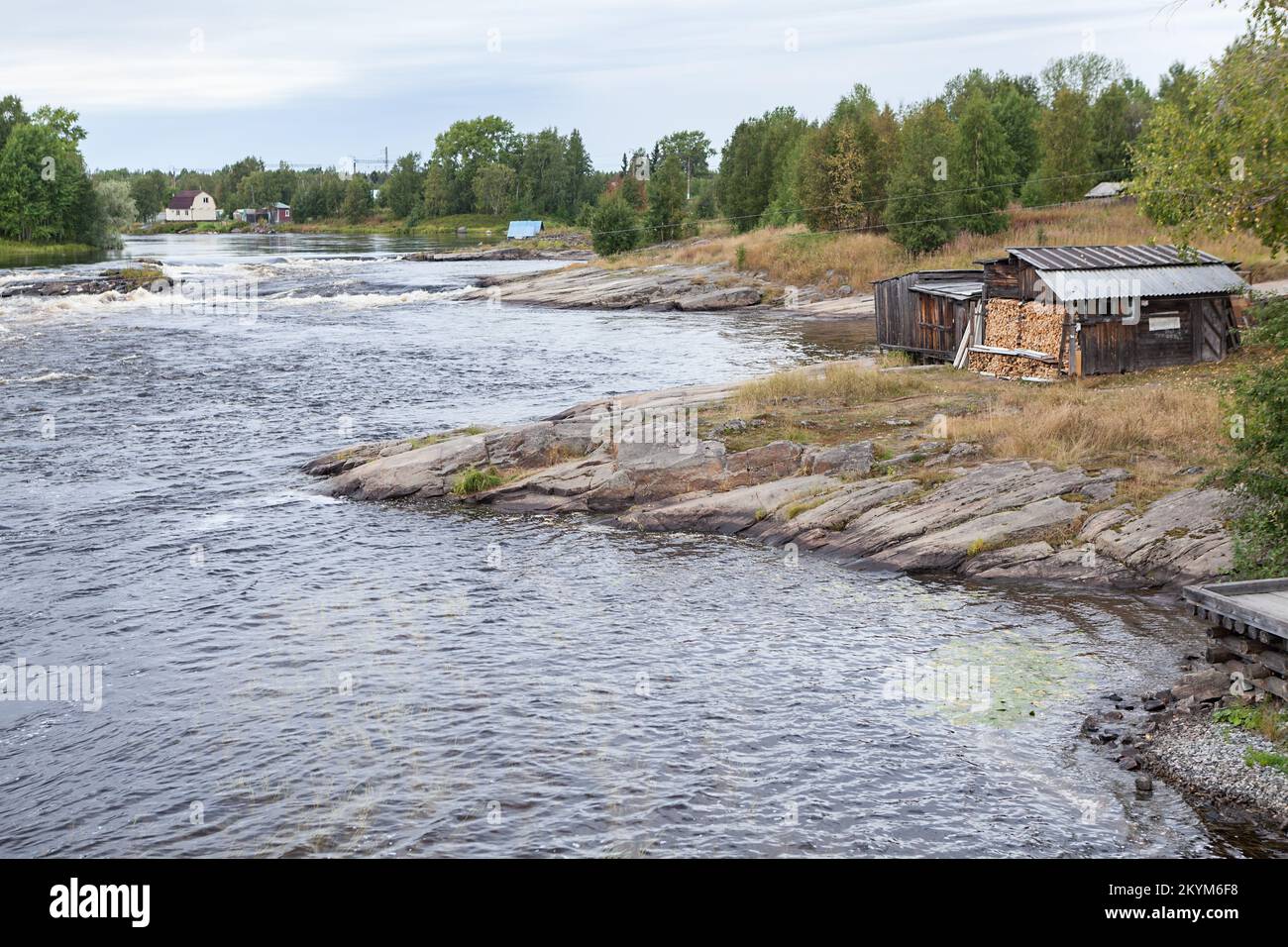 Rocky bank of the Nizhny Vyg river in the city of Belomorsk, Karelia, northern Russia Stock Photo