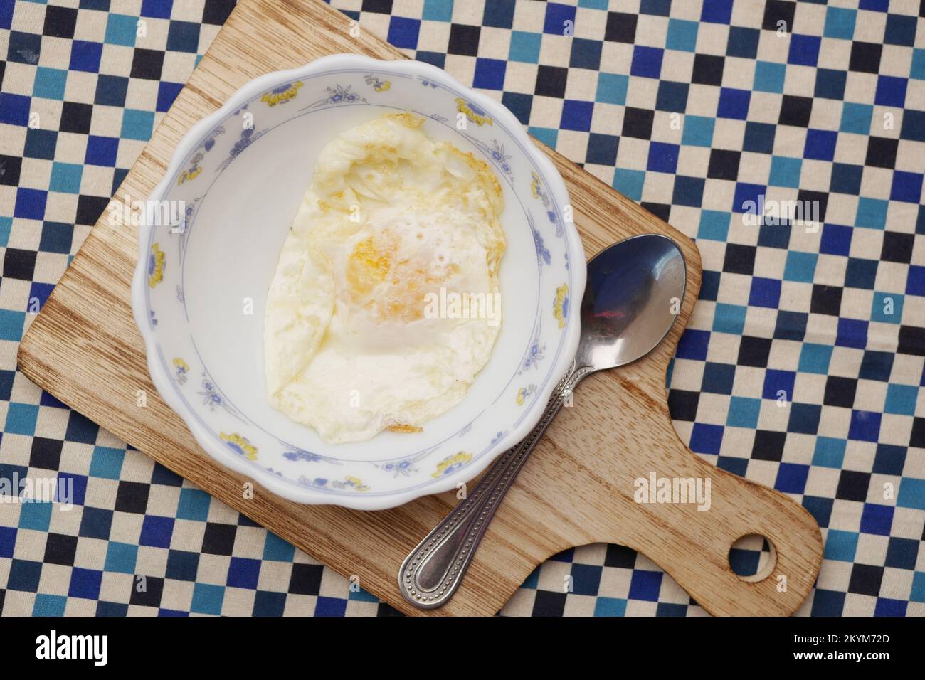 Fried eggs in the plate close up , Stock Photo