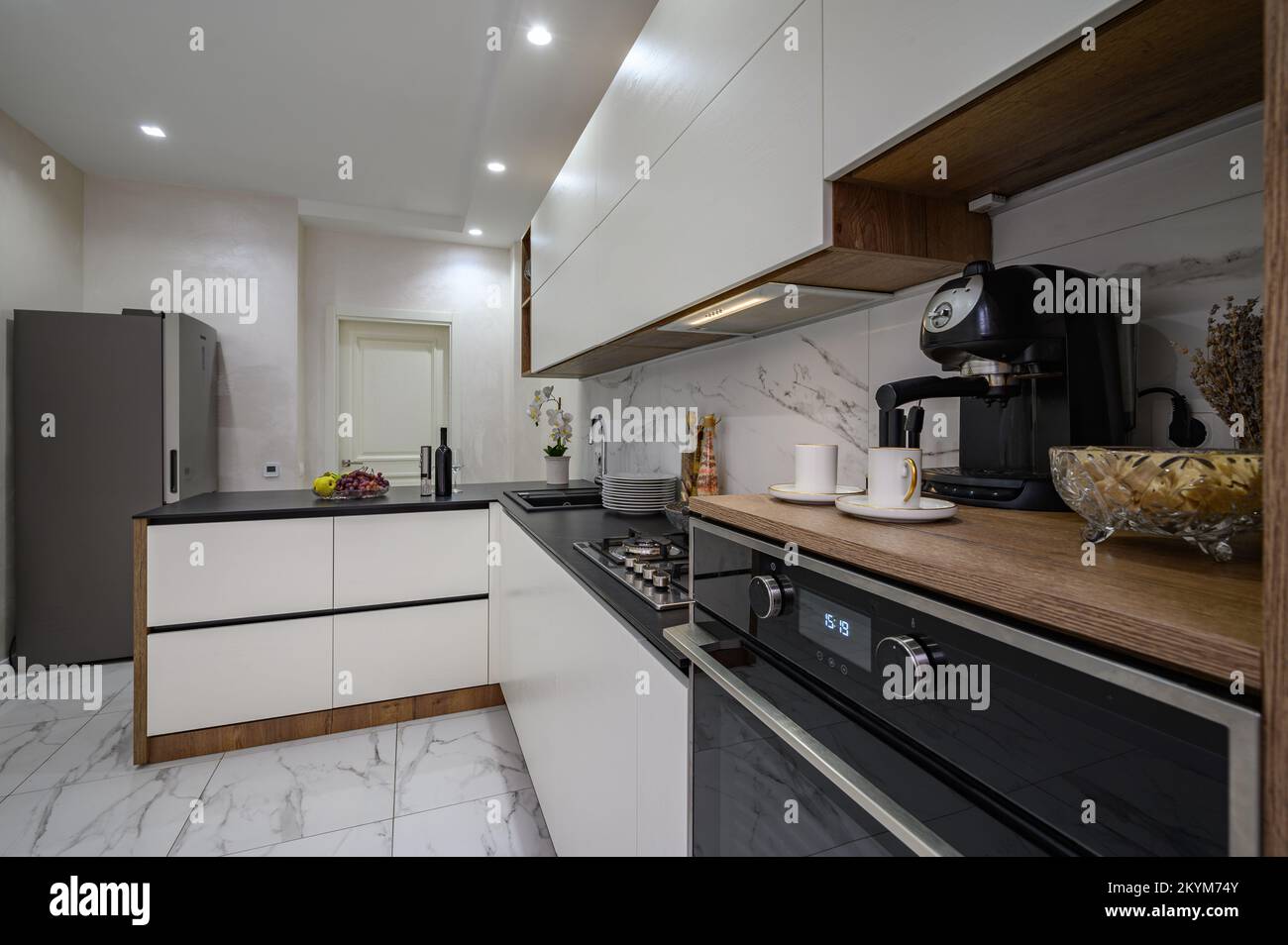 Large white and black luxury kitchen interior Stock Photo